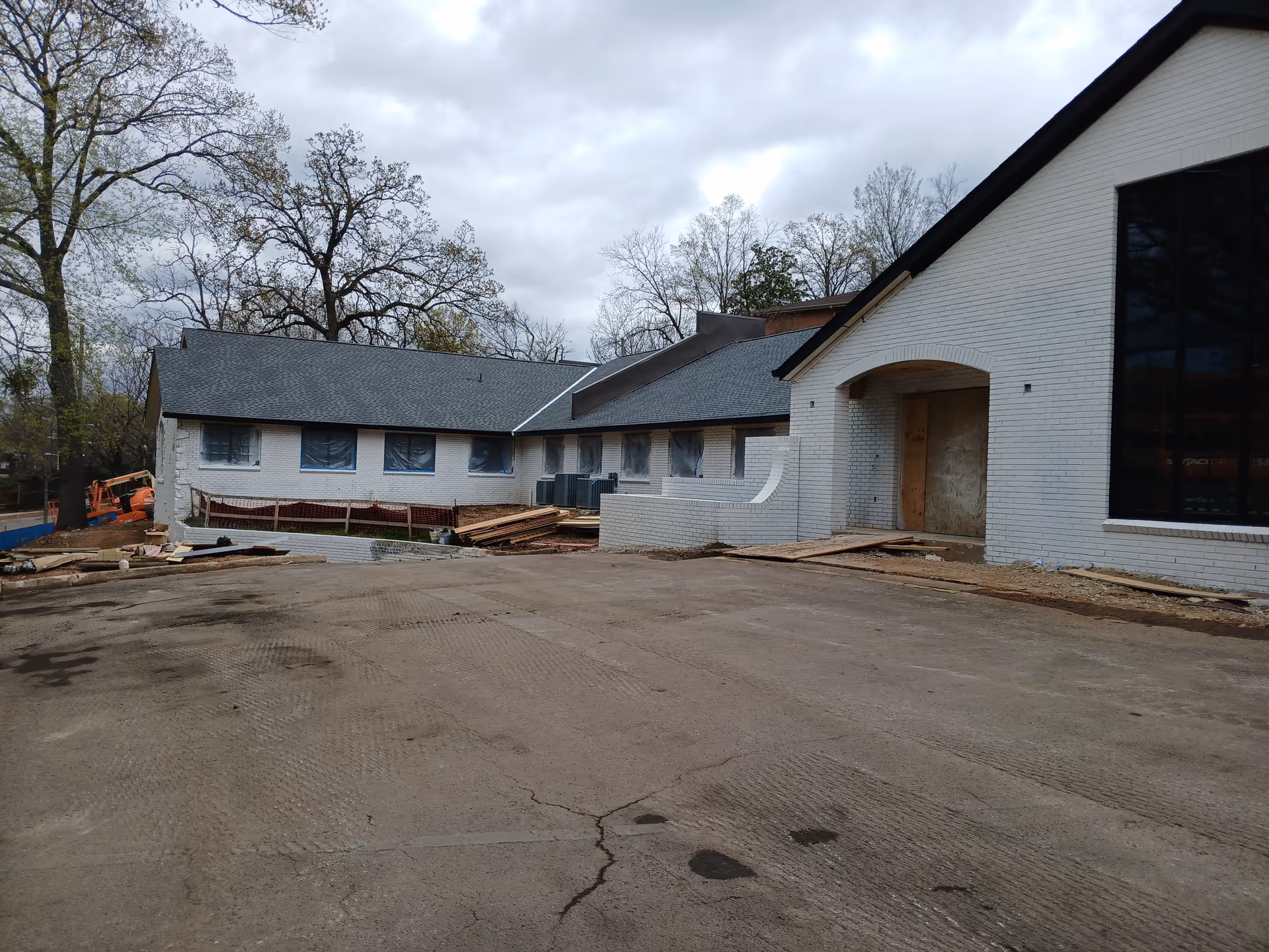 Exterior view of Greenbriar on Hanover showing a brick building under construction.