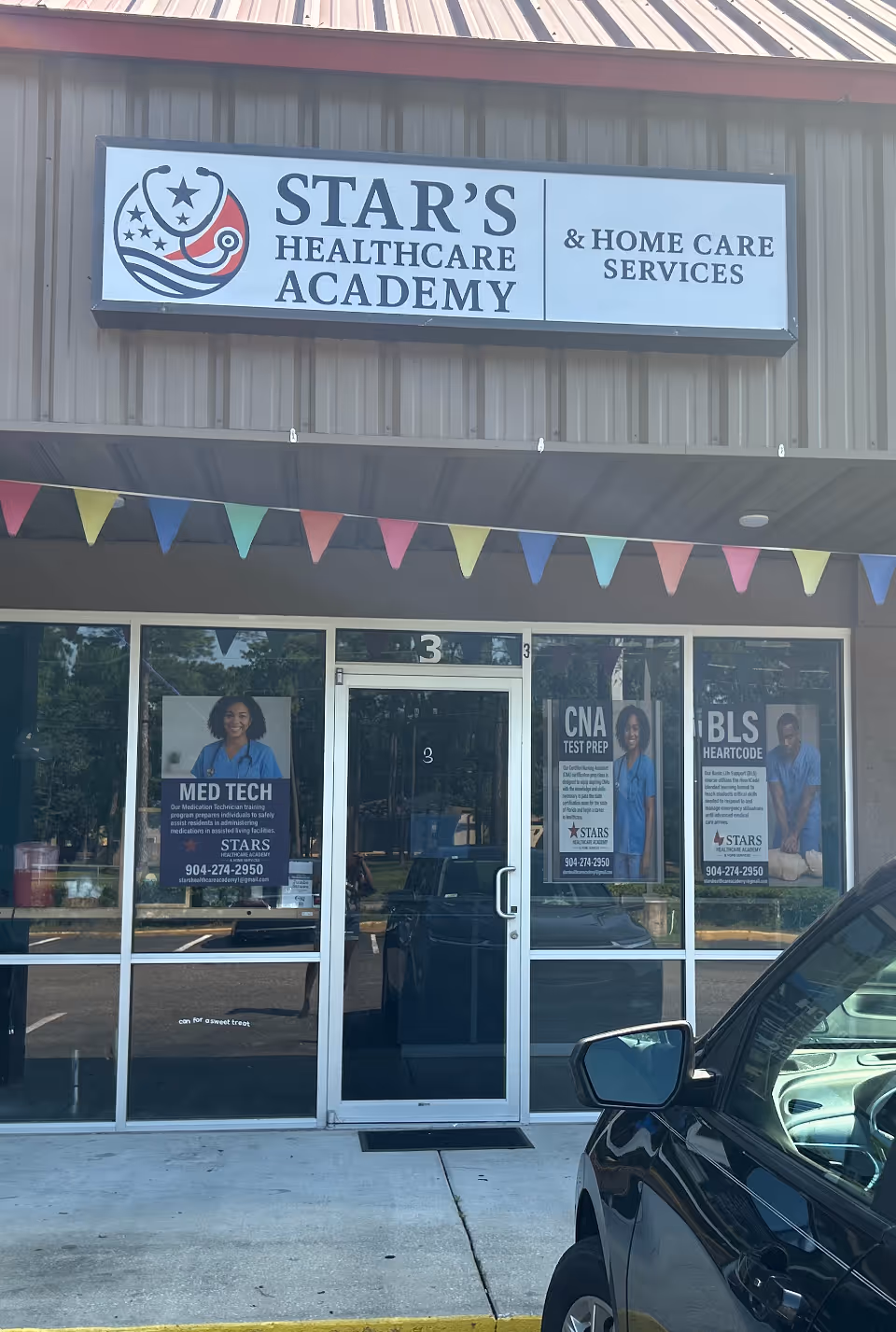 Front of a building with Star's Healthcare Academy & Home Care Services signage.