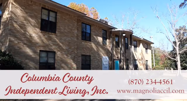 Brick, two-story building exterior with a large sign for Columbia County Independent Living, Inc.