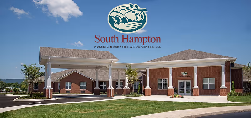 Front exterior of a red-brick nursing and rehabilitation center with a covered porte-cochère and the 'South Hampton' logo above.