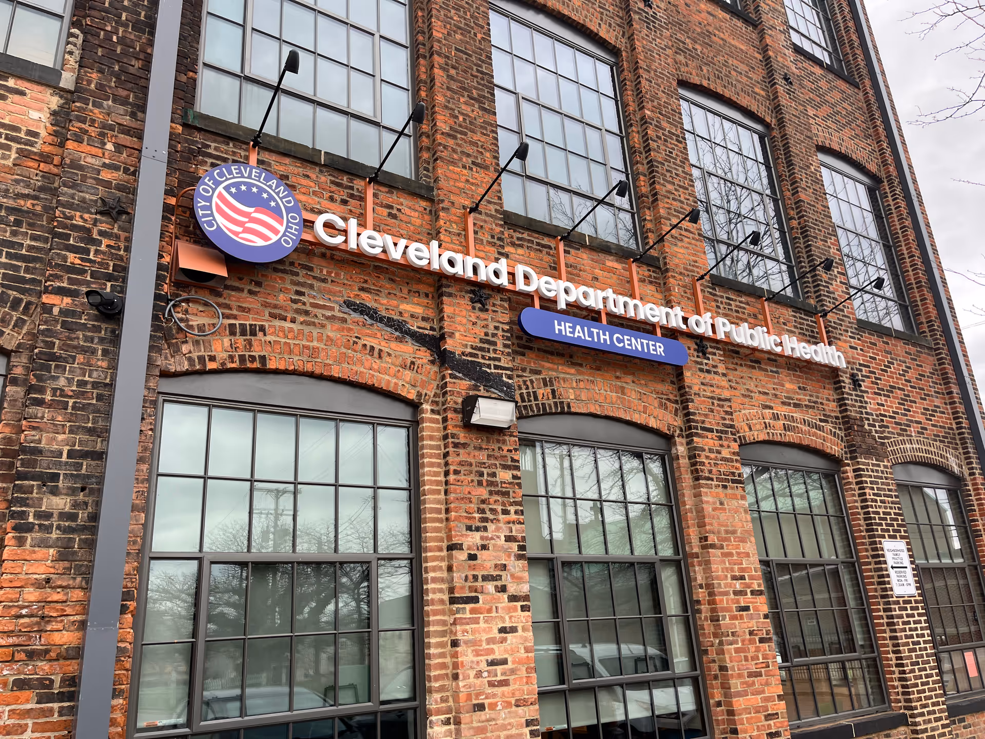 Brick building facade with Cleveland Department of Public Health Health Center sign.