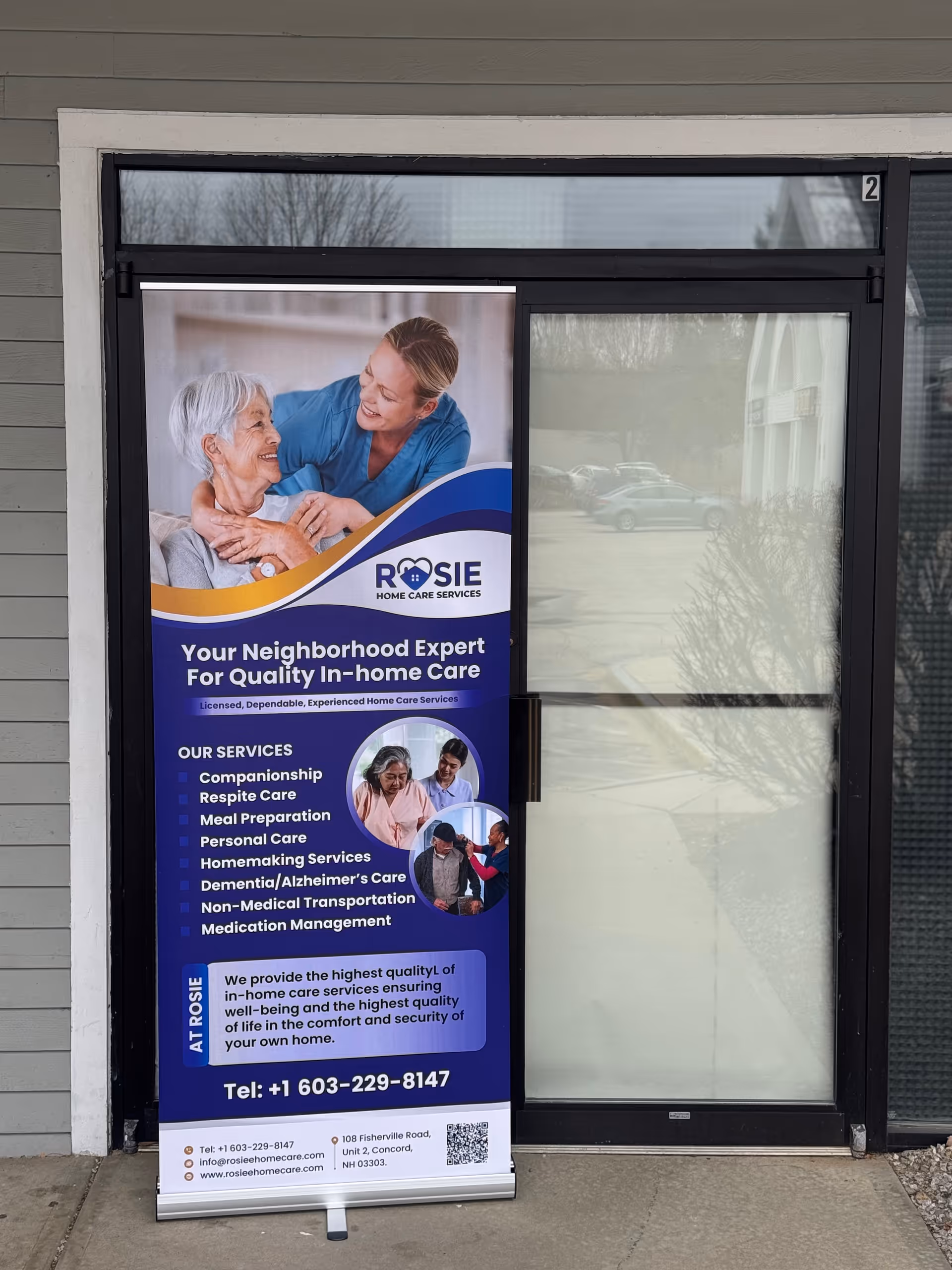Exterior door with a Rosie Home Care Services banner advertising in-home care.