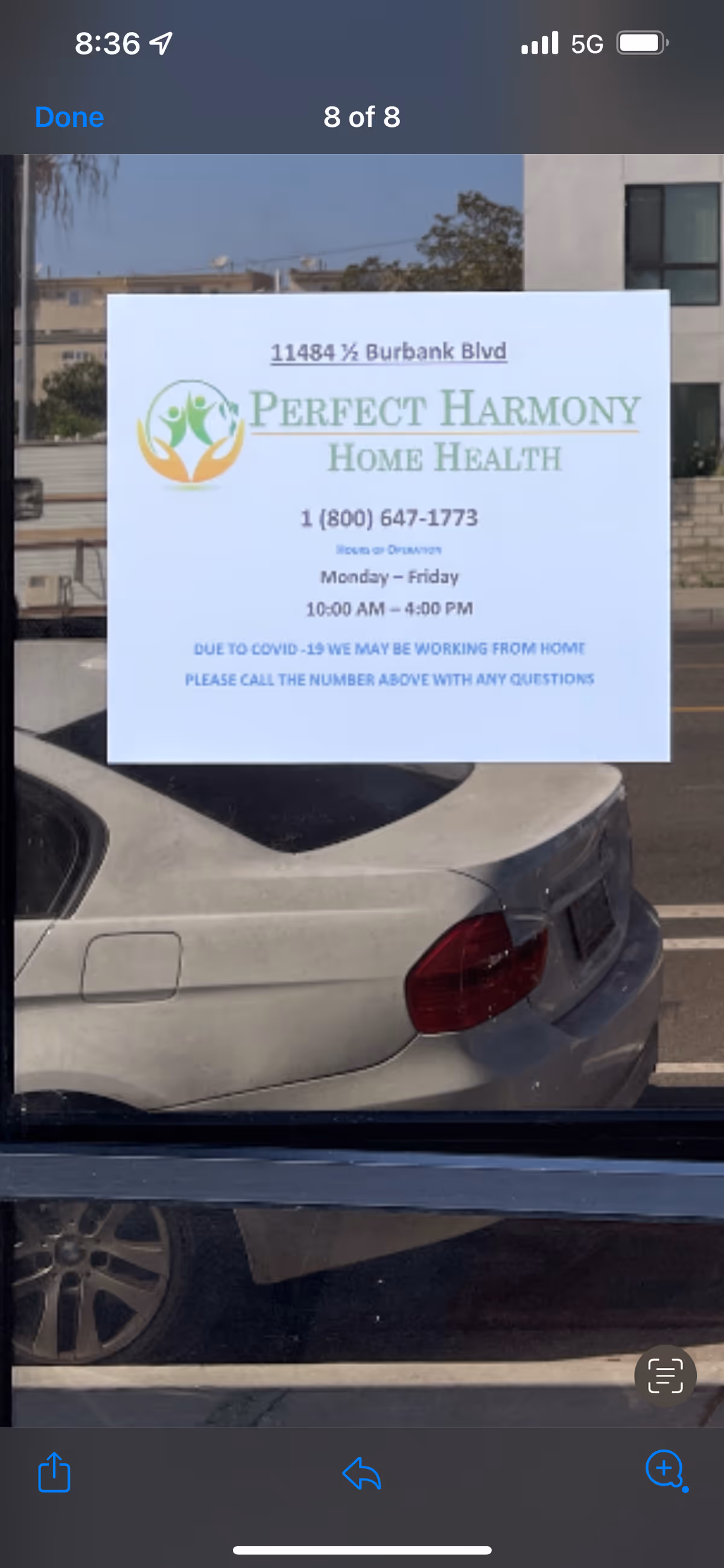 Outdoor photo of a car window sign displaying Perfect Harmony Home Health, Inc.