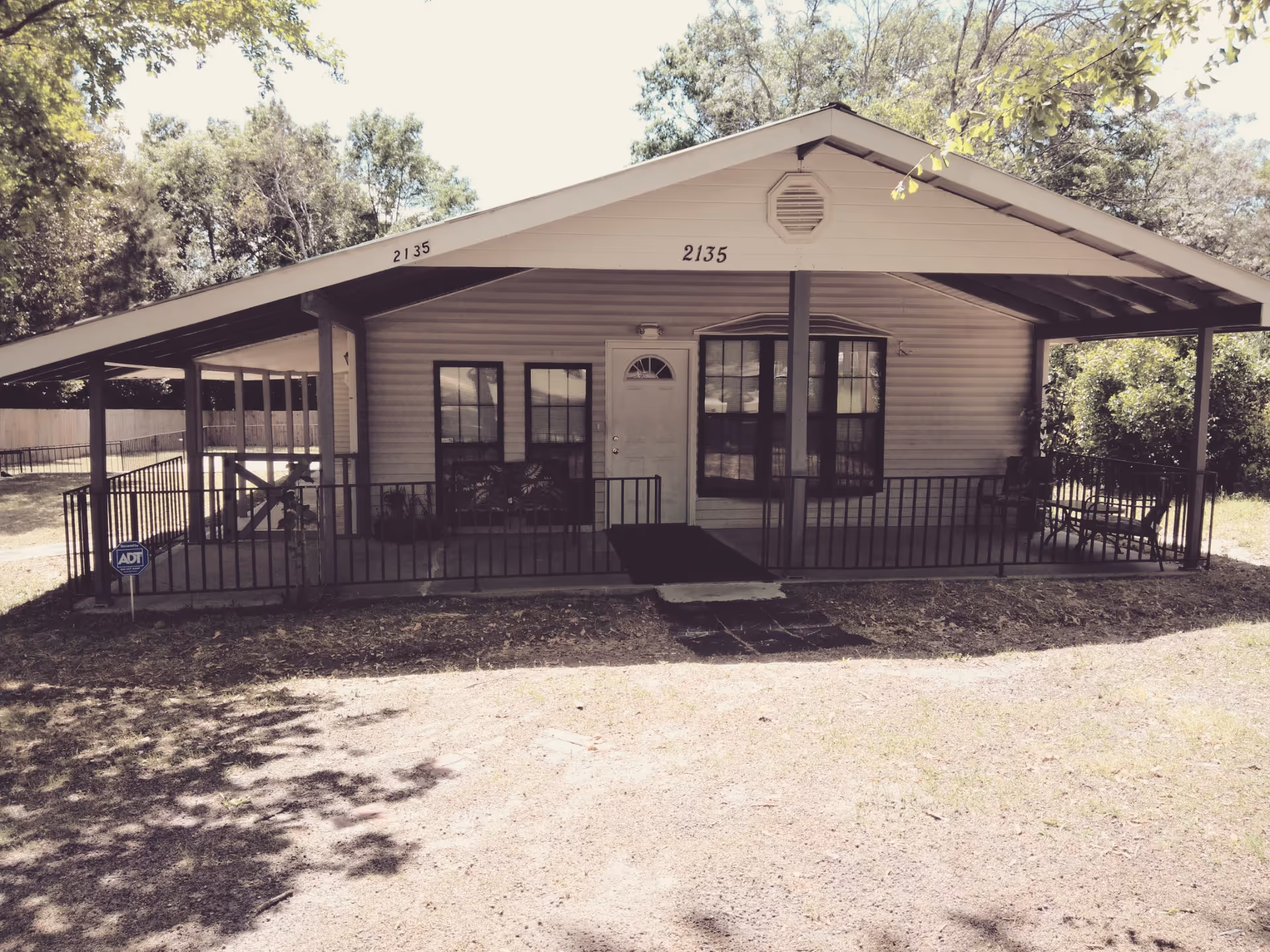 Front exterior of House of Love on Sibley, a single-story facility with porch.