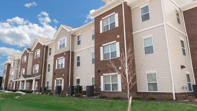 Exterior view of The Reserve at Lakeview Landing senior living building.