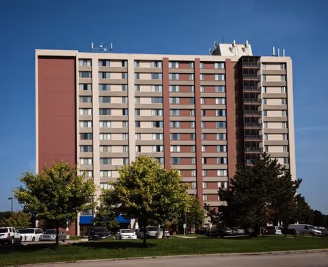 Exterior view of Dearborn Heights Co-Op Towers, a tall multi-story senior living building.