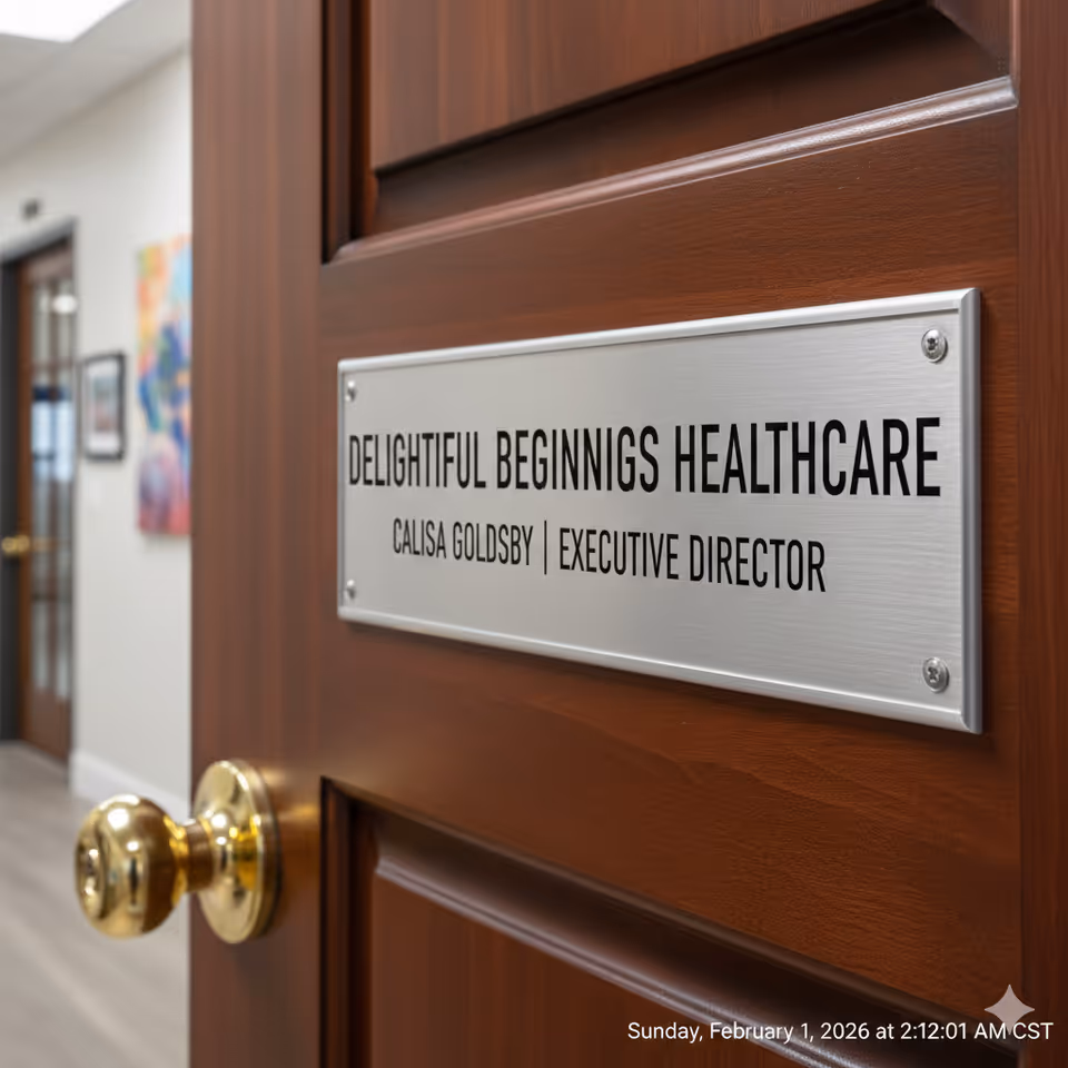 Door plaque on a wooden interior door reads Delightful Beginnings Healthcare and Executive Director Calisa Goldsby.