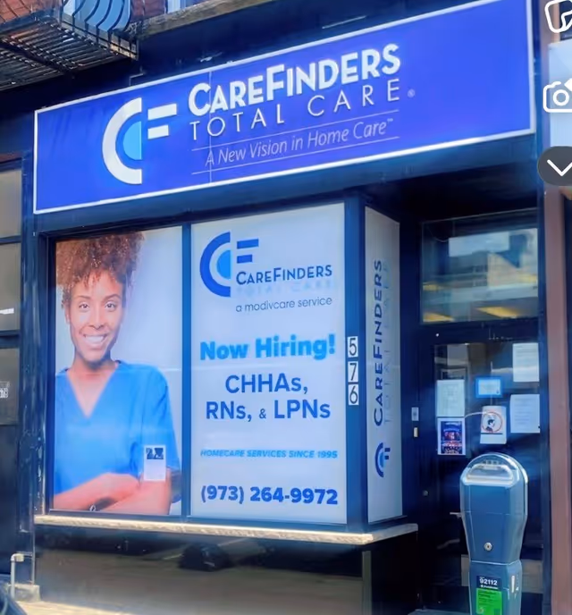 CareFinders Total Care storefront with blue sign and Now Hiring banner