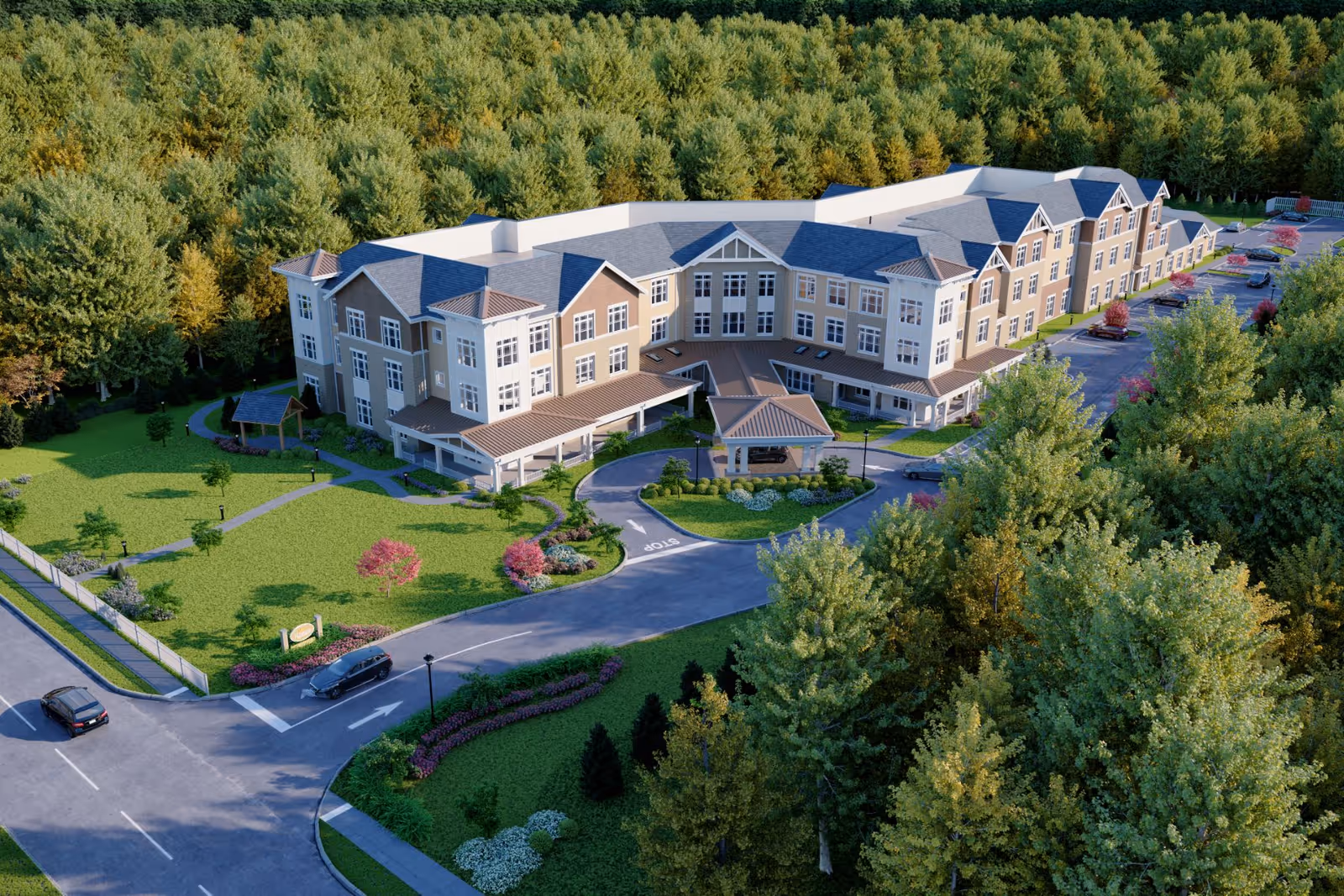 Aerial view of Sunrise of Livingston campus with beige buildings, parking, and lush trees