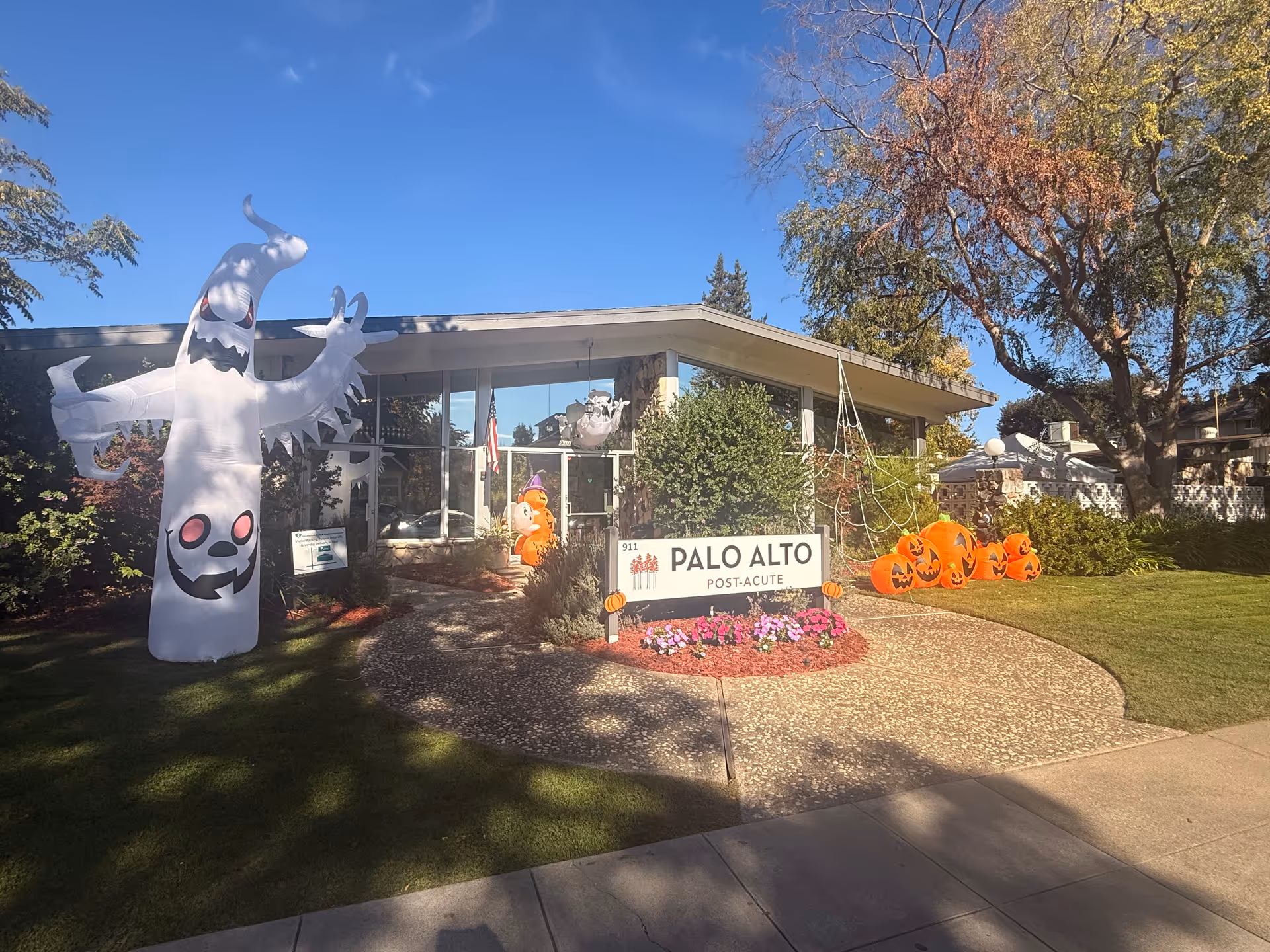 Exterior view of Palo Alto Post-Acute with Halloween decorations.