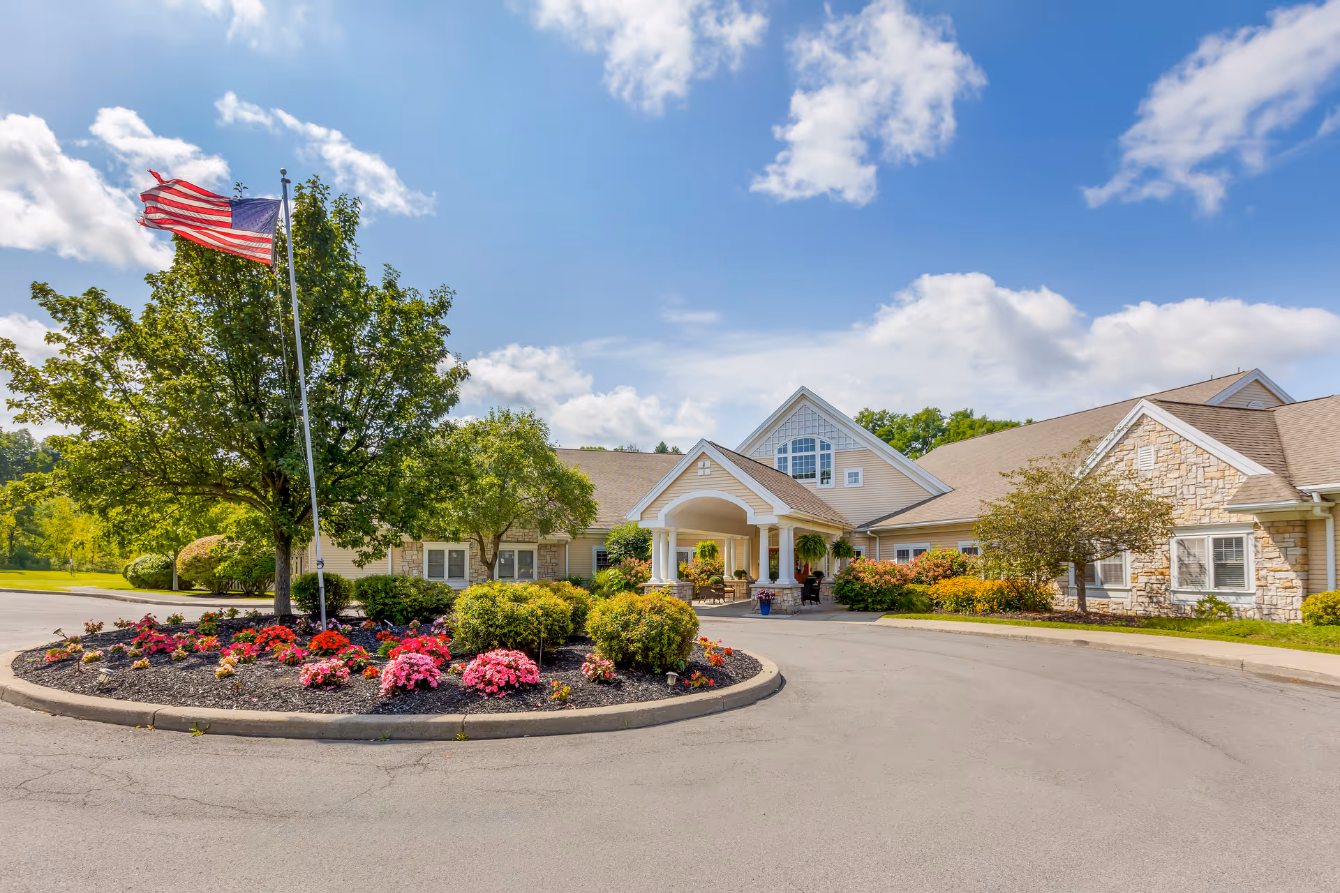 Brookdale Fayetteville senior living facility exterior with circular driveway and landscaped entrance