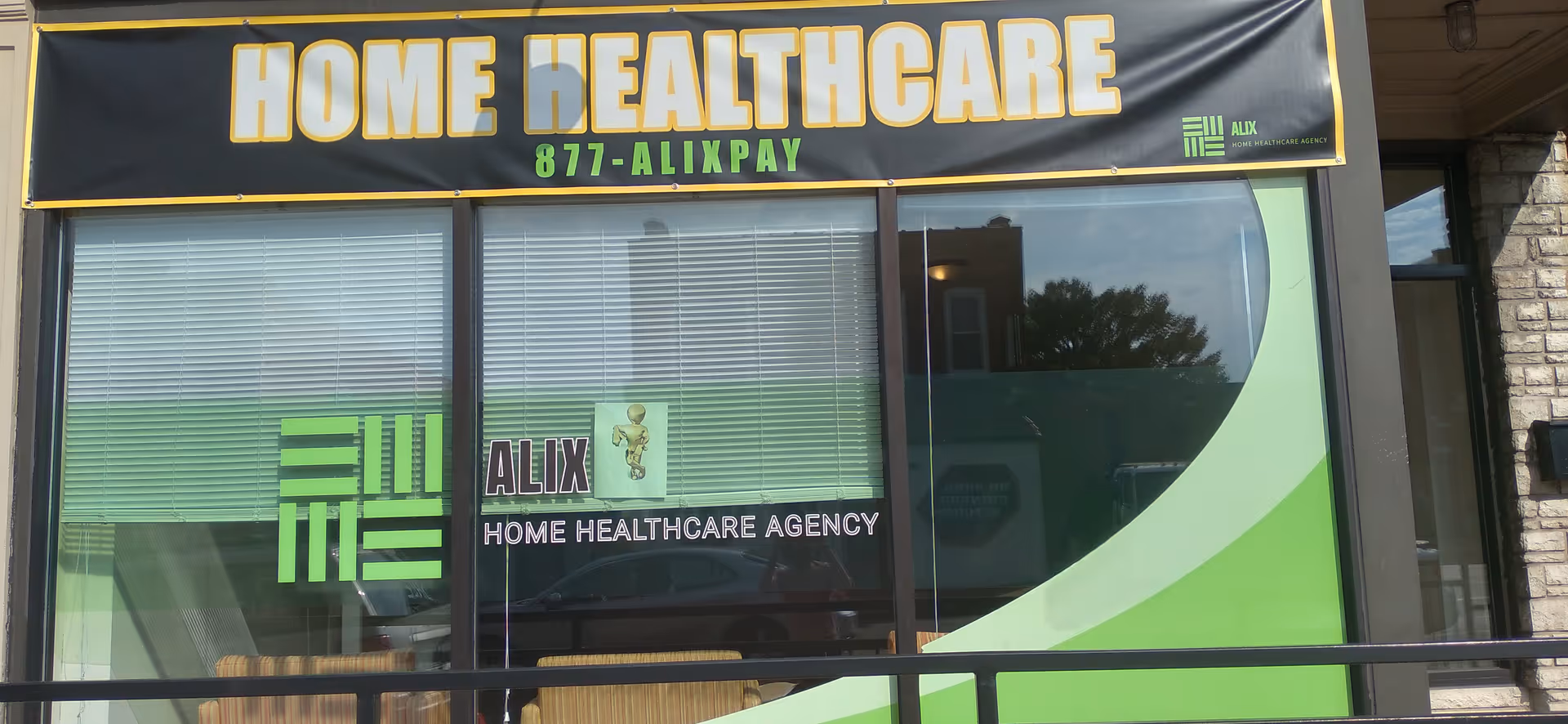 Exterior storefront with 'Home Healthcare' signage and ALIX branding on glass.