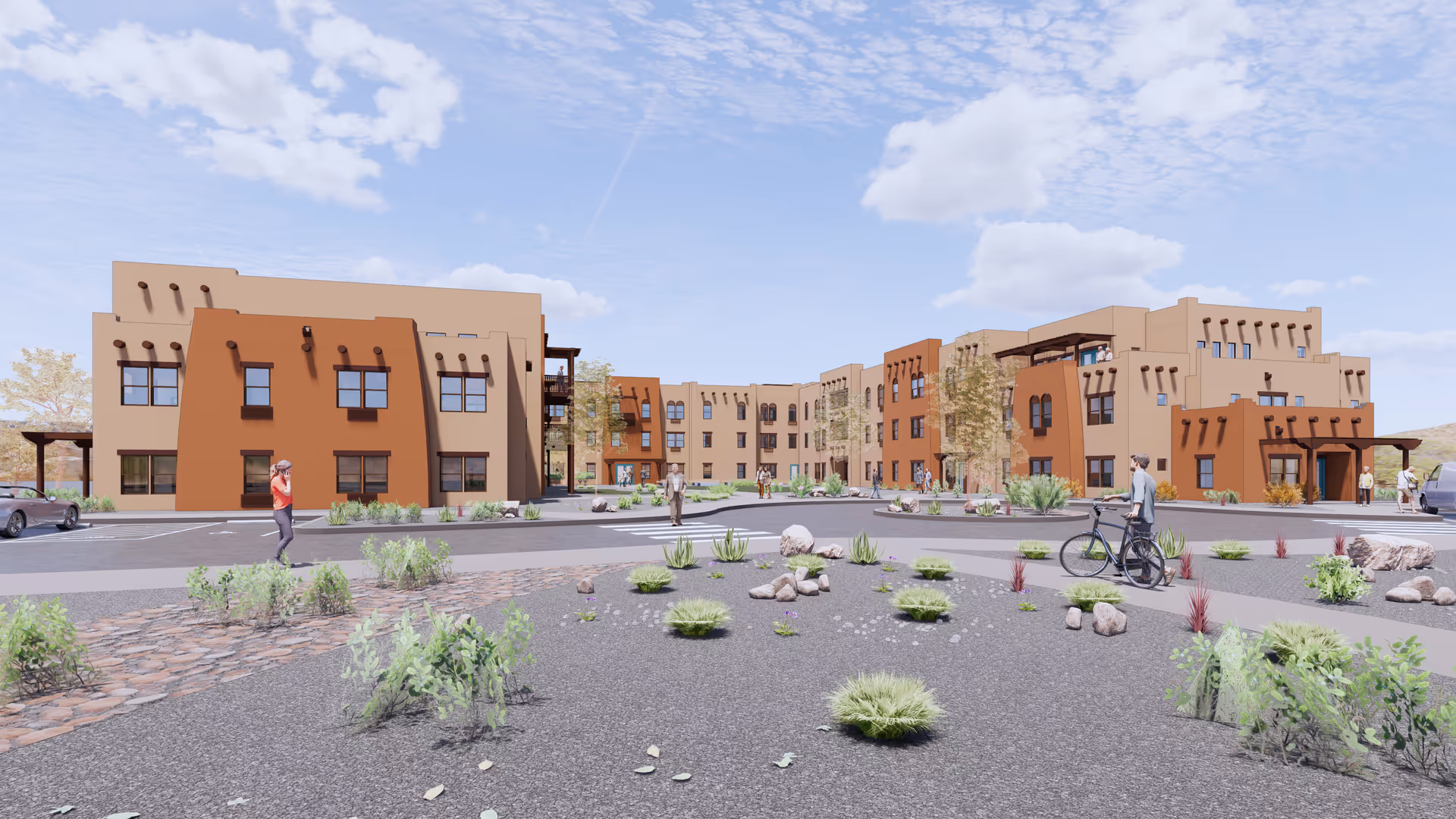 Exterior view of Ativo Senior Living of Albuquerque showing a large, multi-story building with southwestern architectural style, featuring tan and brown stucco walls, multiple windows, and balconies. The foreground includes desert landscaping with rocks and shrubs, a paved driveway, and several people walking and standing, including one person with a bicycle.