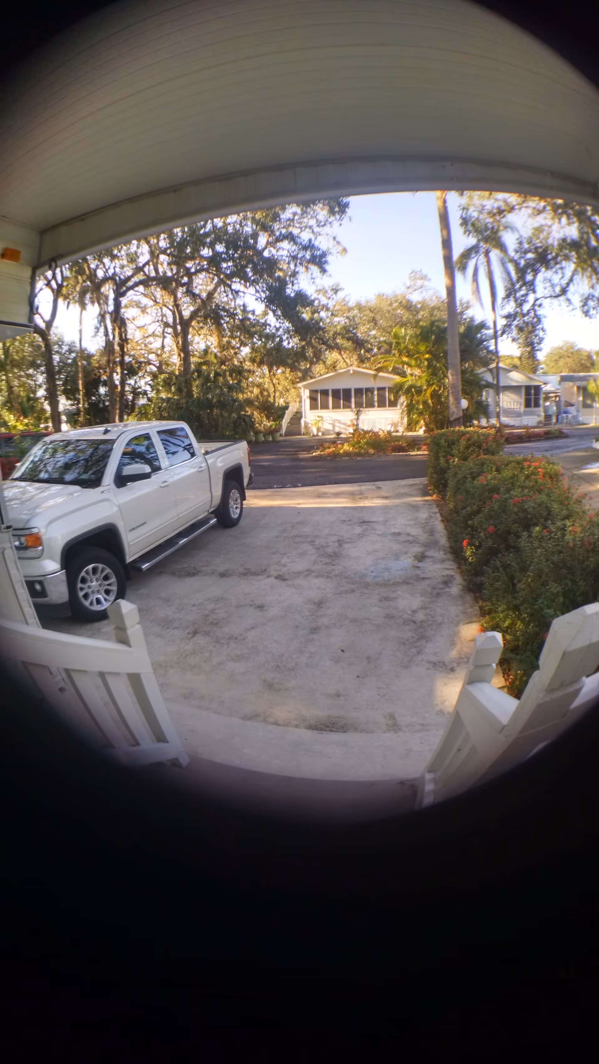 Front exterior view of Sugar Creek Estates with a white pickup in the driveway.