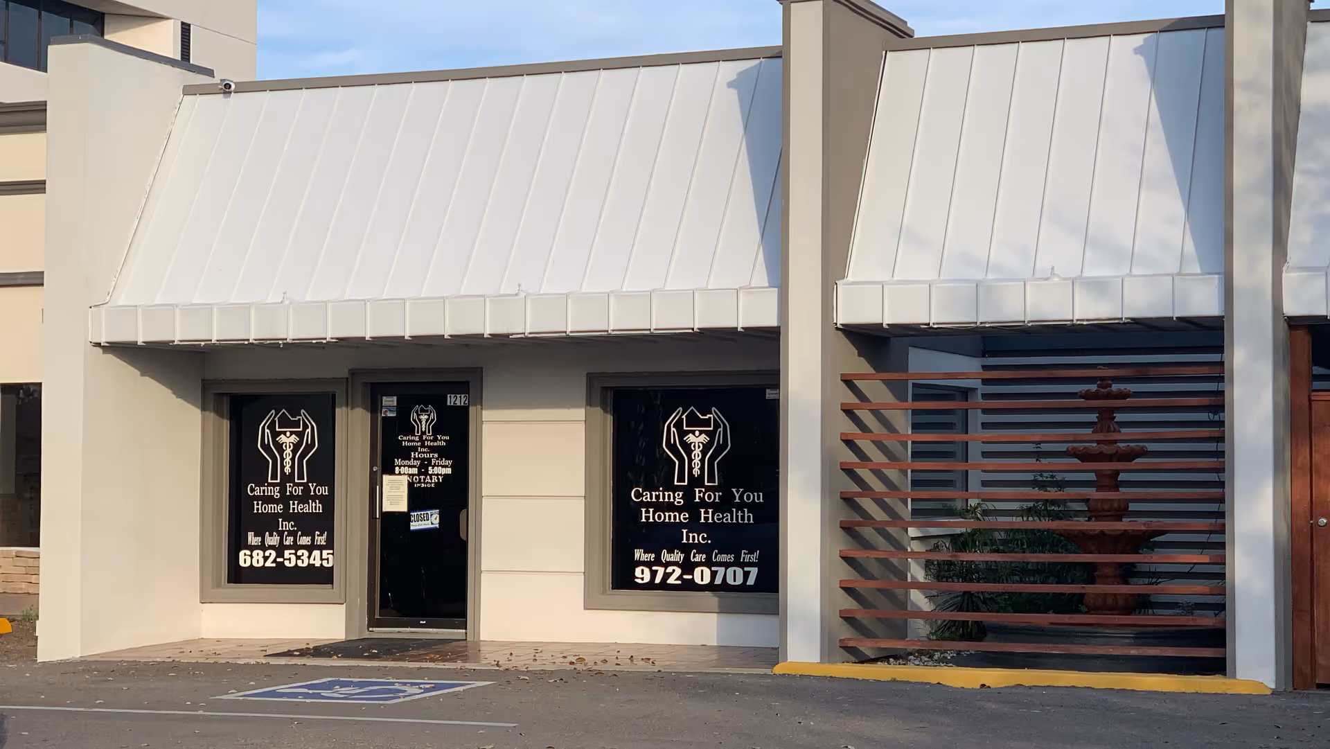 Exterior view of Caring For You Home Health building with two front doors and signage.