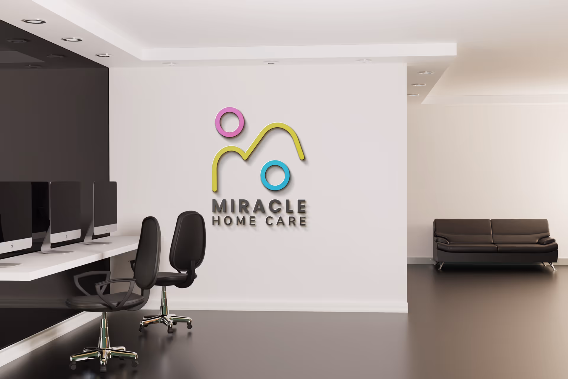Modern office reception with logo wall reading Miracle Home Care and a sofa.