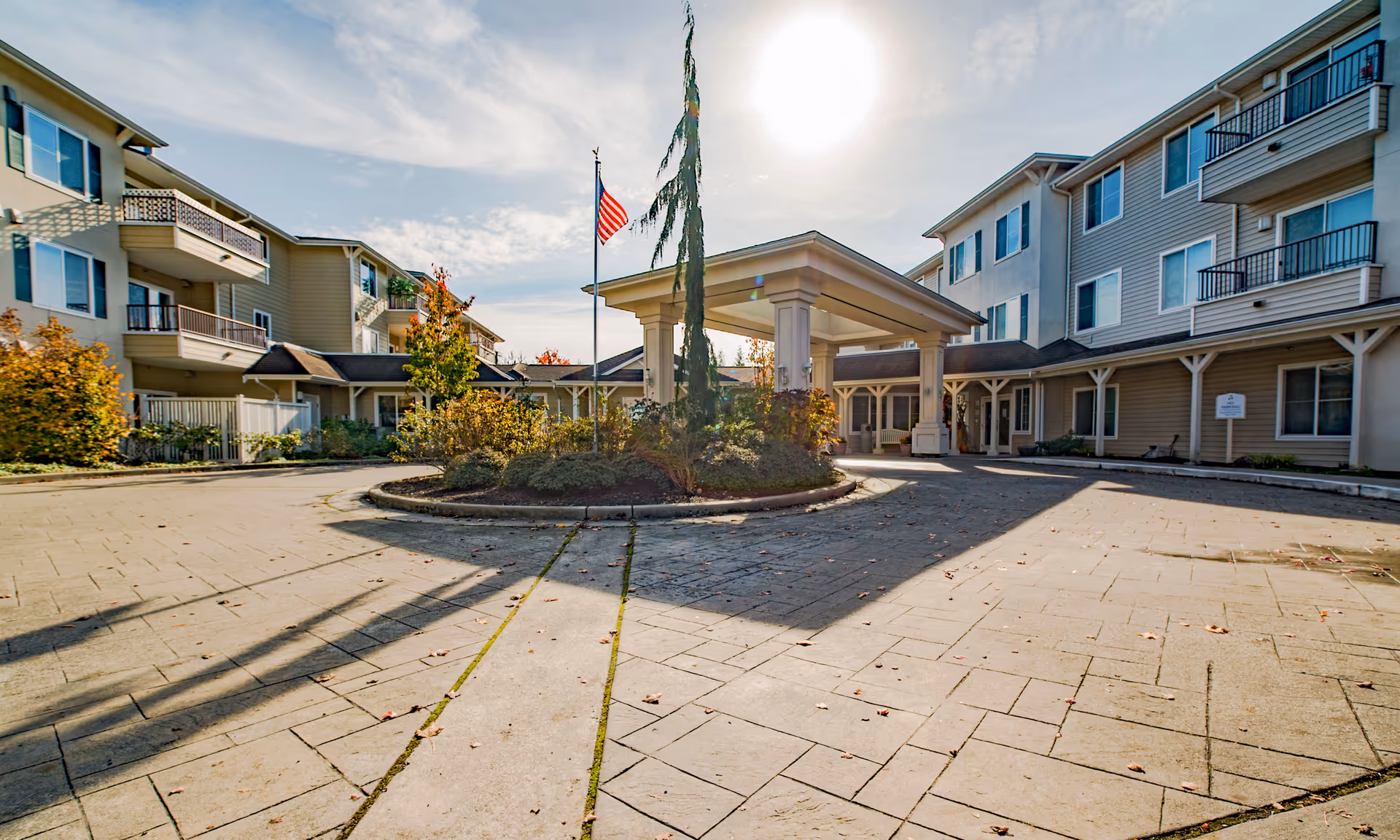 Exterior view of Brookdale Stanwood with circular driveway and entrance canopy.