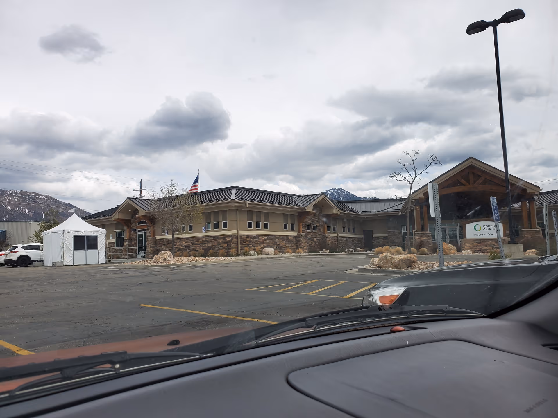 Exterior view of Ogden Clinic Mountain View with parking lot and entrance.