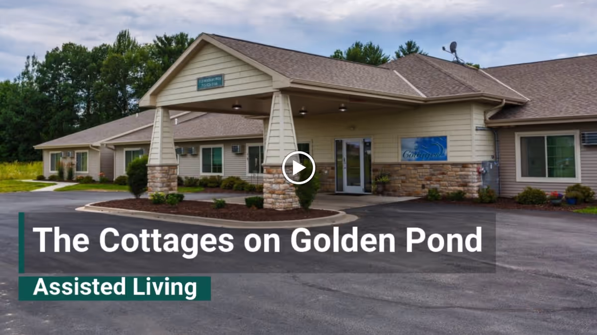 Front exterior of The Cottages on Golden Pond assisted living building with a covered entrance and driveway.