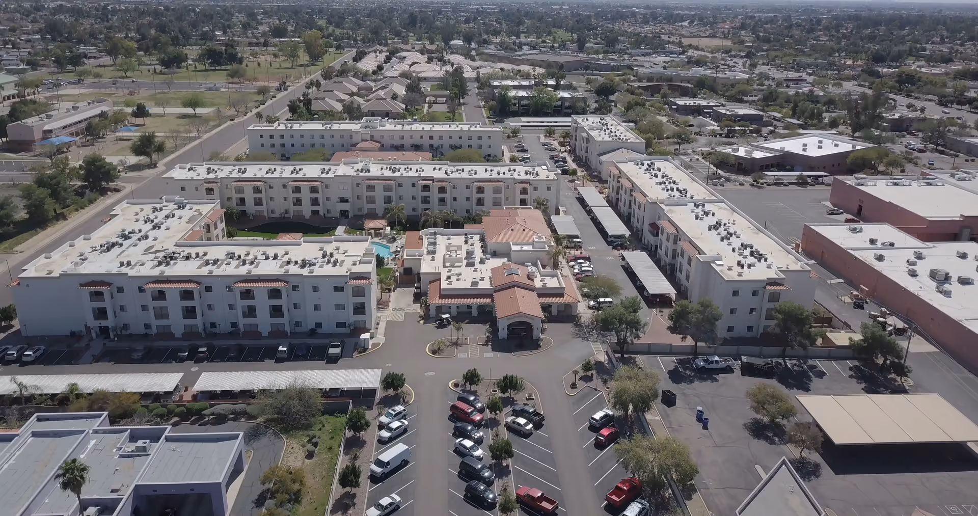 Aerial view of Fellowship Square-Mesa campus with connected buildings and parking.