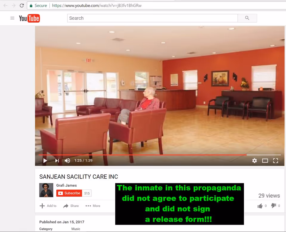 Senior lounge lobby with red wall, reception desk, and a seated elderly resident.