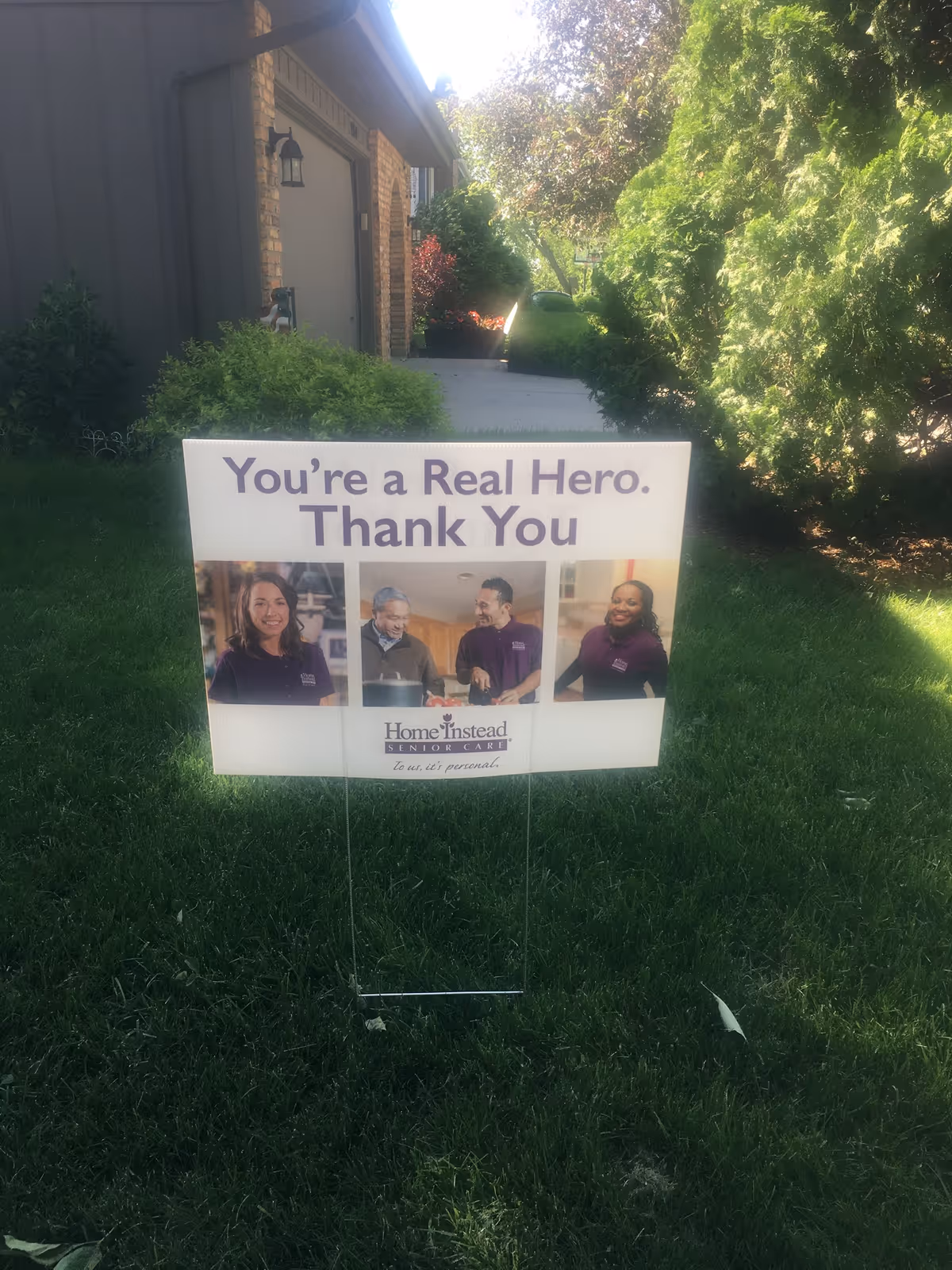 A lawn sign outside a Home Instead Senior Care facility expresses thanks.