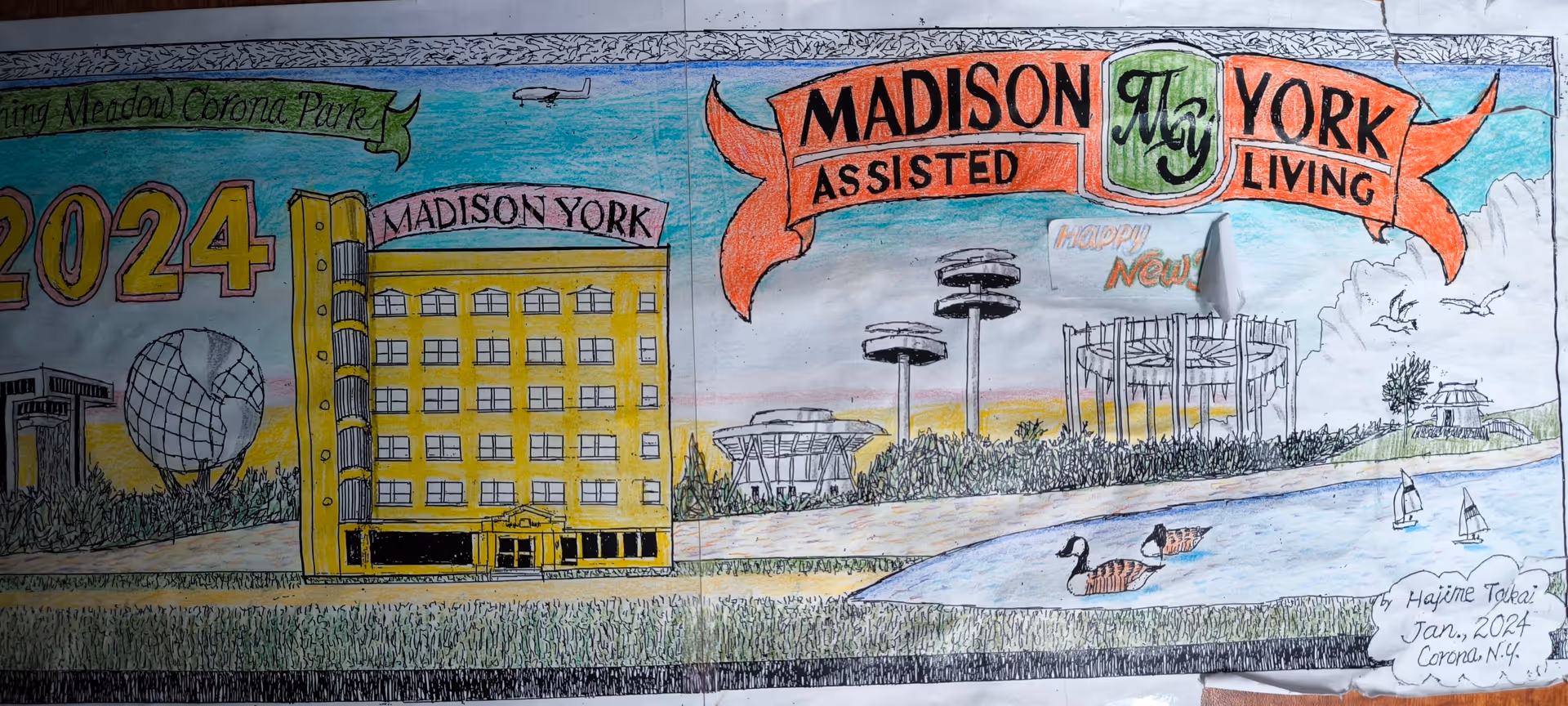 Colorful mural featuring Madison York Assisted Living exterior with buildings, water, and greenery.