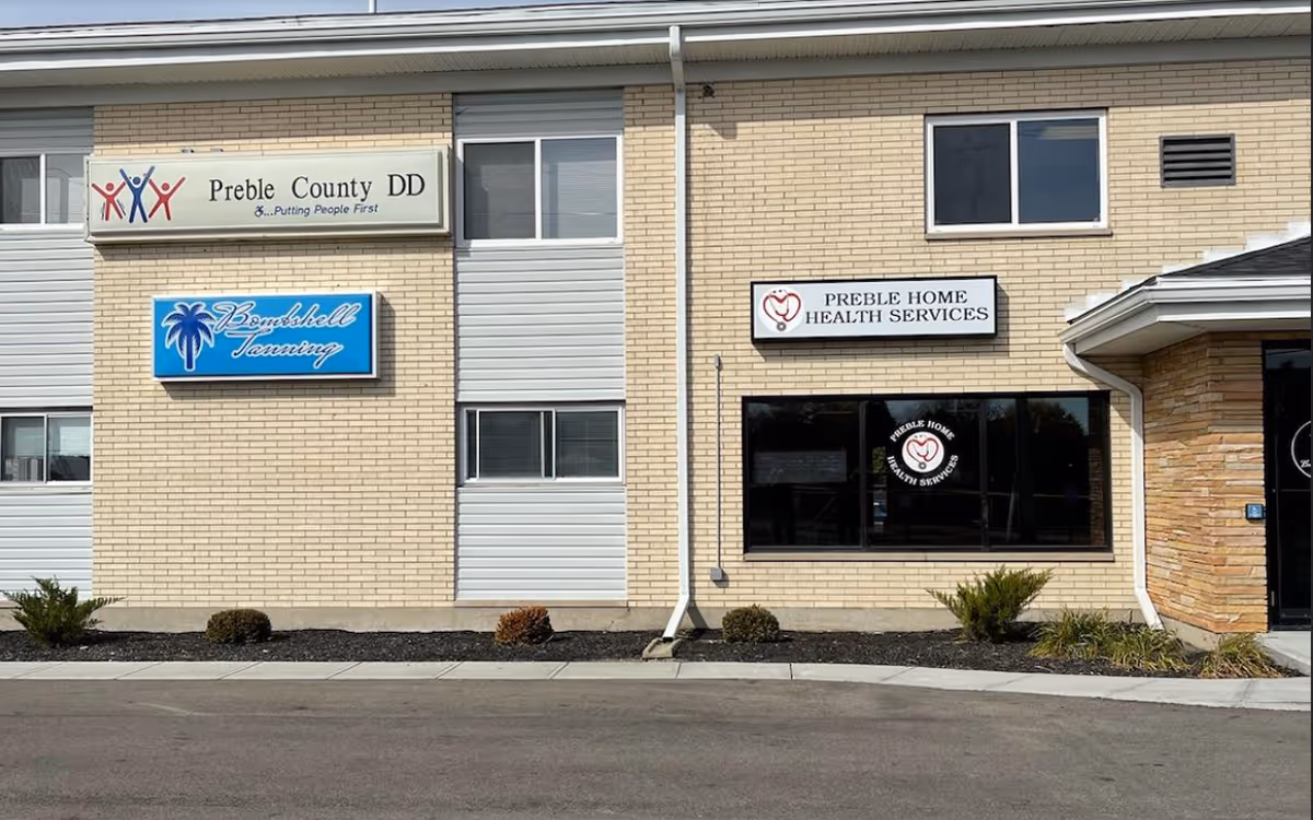 Exterior of a beige brick building with Preble Home Health Services signage