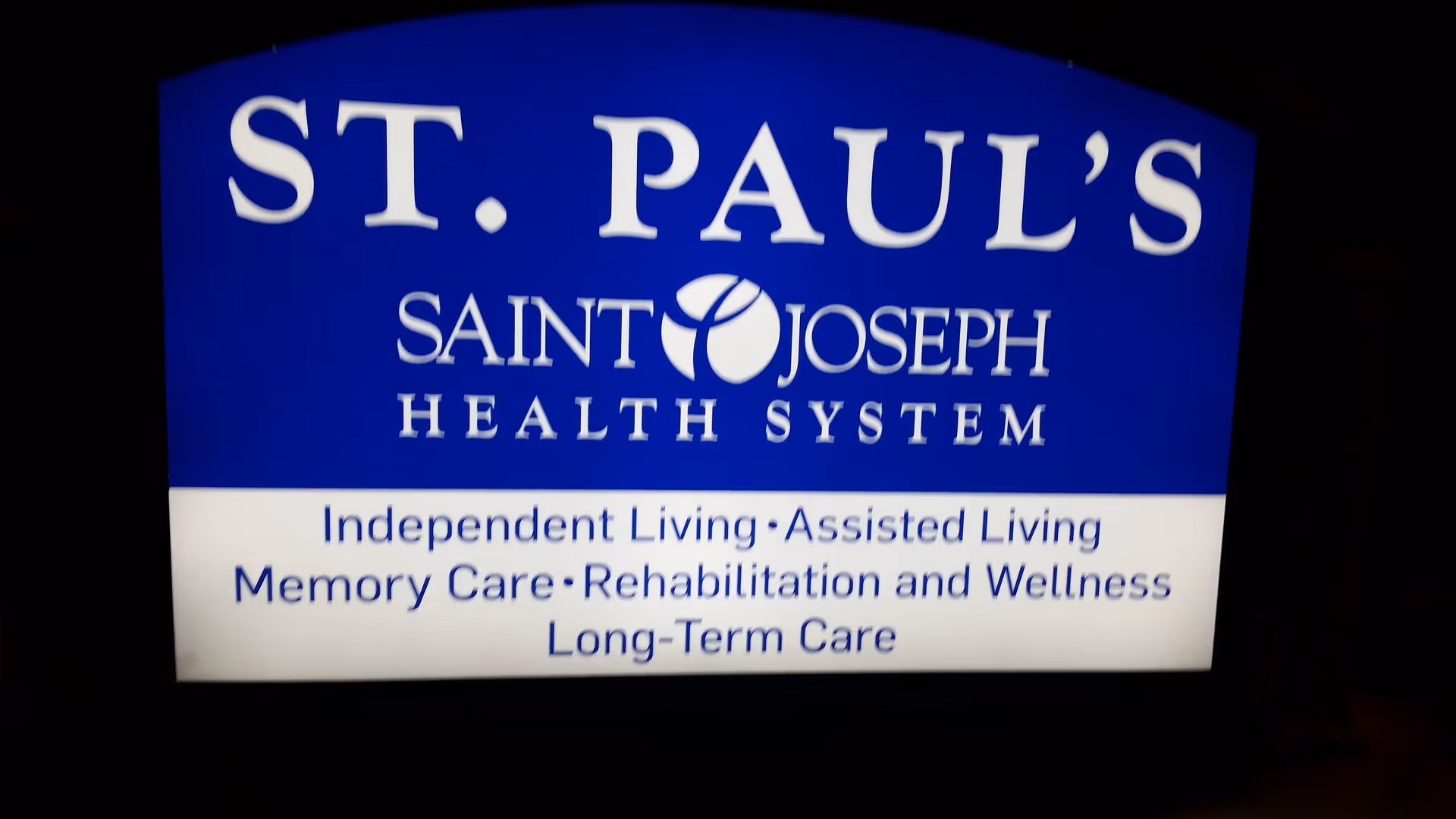 Exterior sign for St. Pauls Saint Joseph Health System listing services.