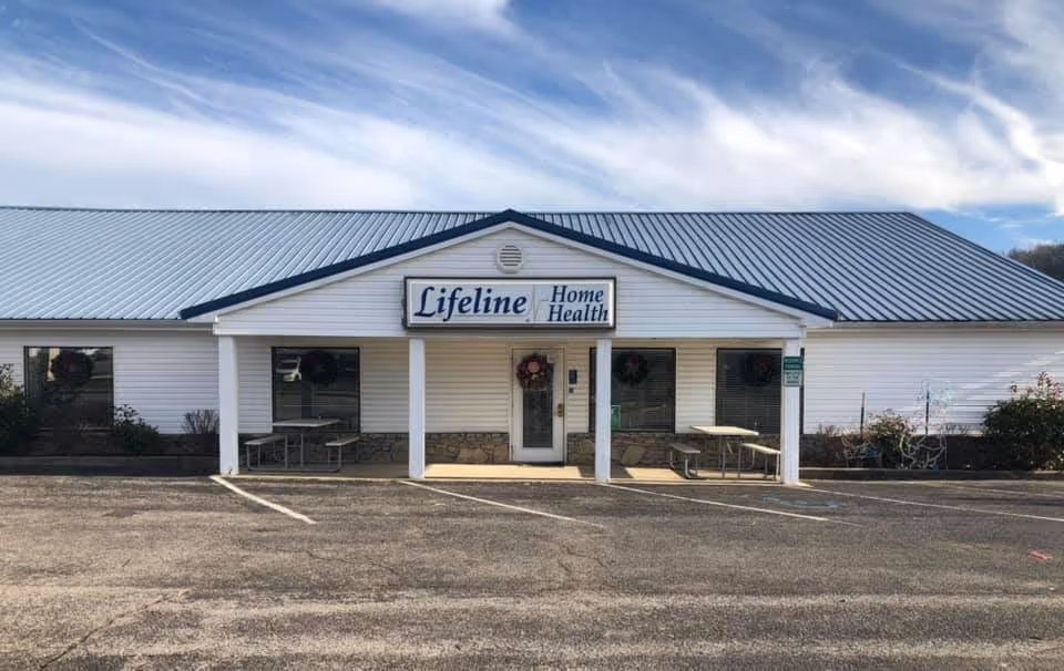 Front view of Lifeline Home Health facility, a white building with porch entrance.