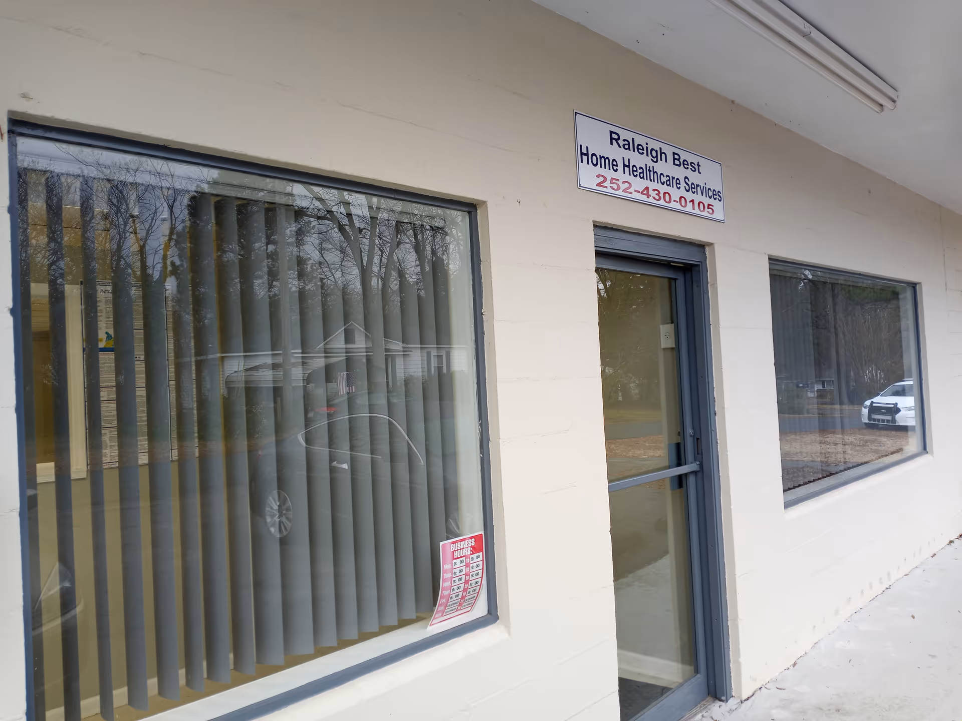 Exterior of Raleigh Best Home Healthcare Services storefront with sign above entrance.