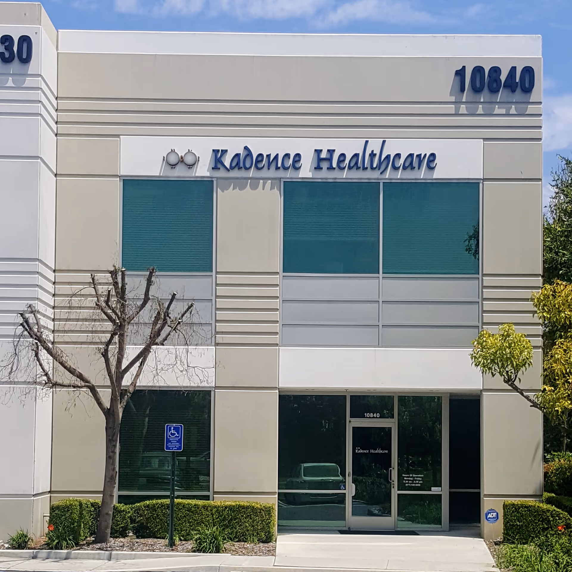 Exterior view of Kadence Healthcare building with teal windows and signage