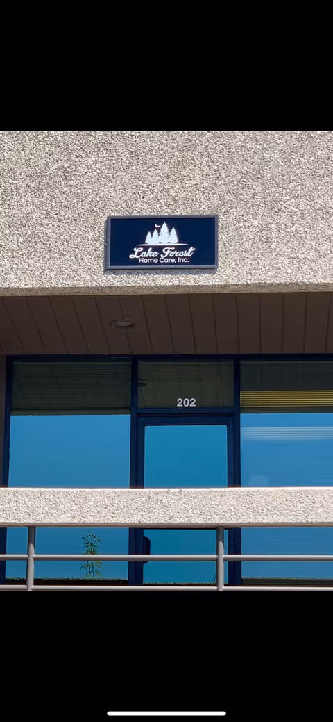 Exterior view of Lake Forest Home Care building entrance with sign.
