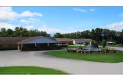 Single-story building of Ellen Memorial Health Care Center with circular driveway and landscaped fountain.