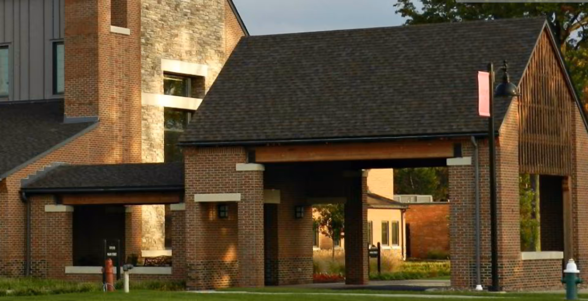 Brick Concord Reserve senior living facility with a covered front entrance.
