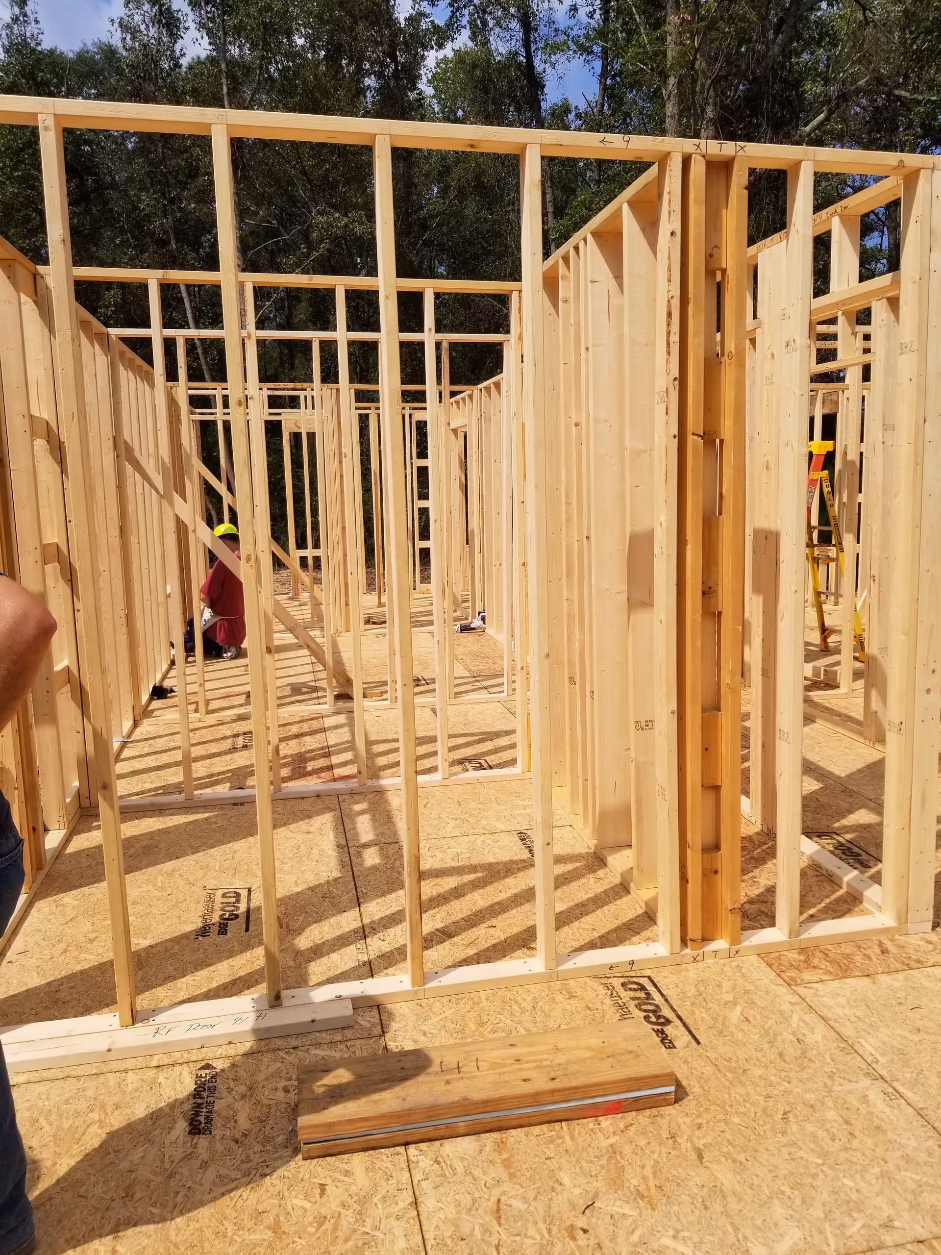 Wooden framed interior walls form a construction site for a senior living facility.