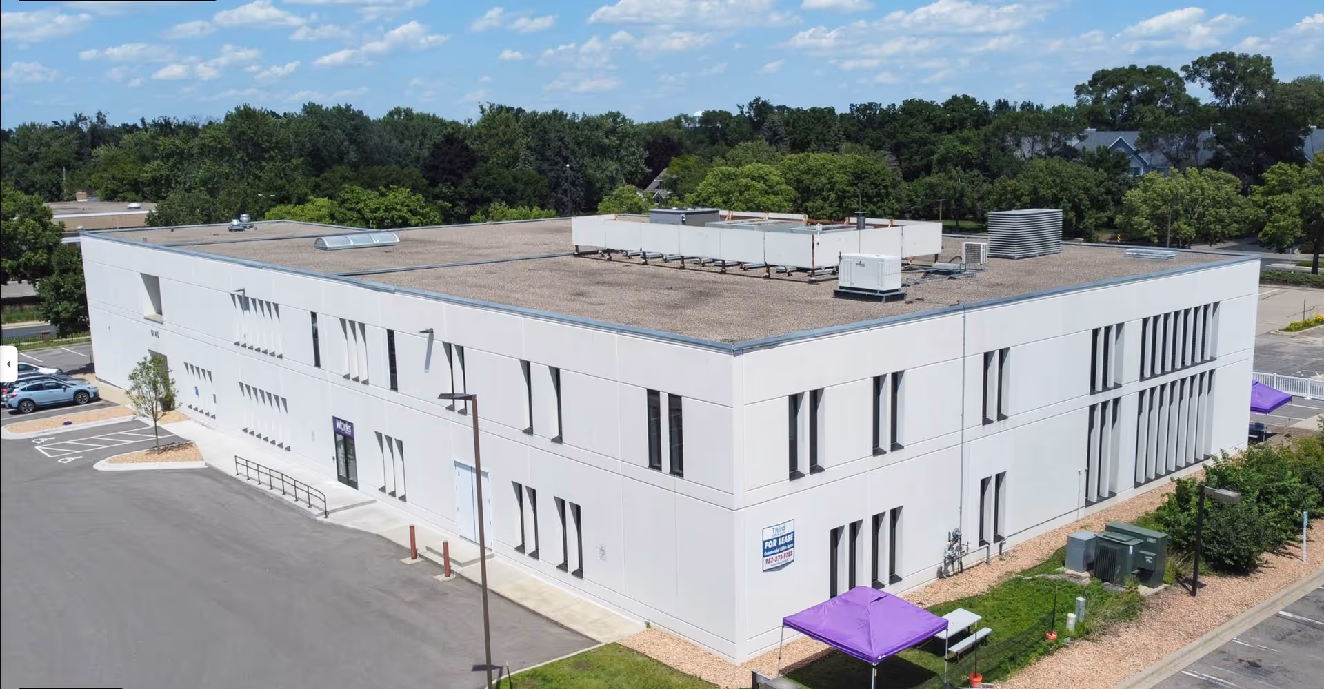 Aerial view of Ontime Health Care, LLC senior living facility exterior.