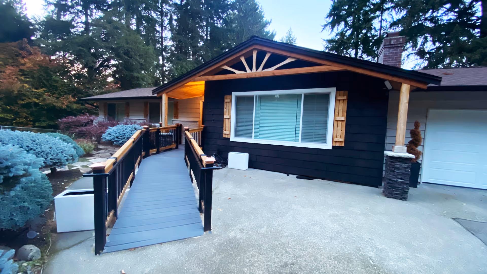 Front exterior of a single-story facility with a wheelchair ramp to the entrance.