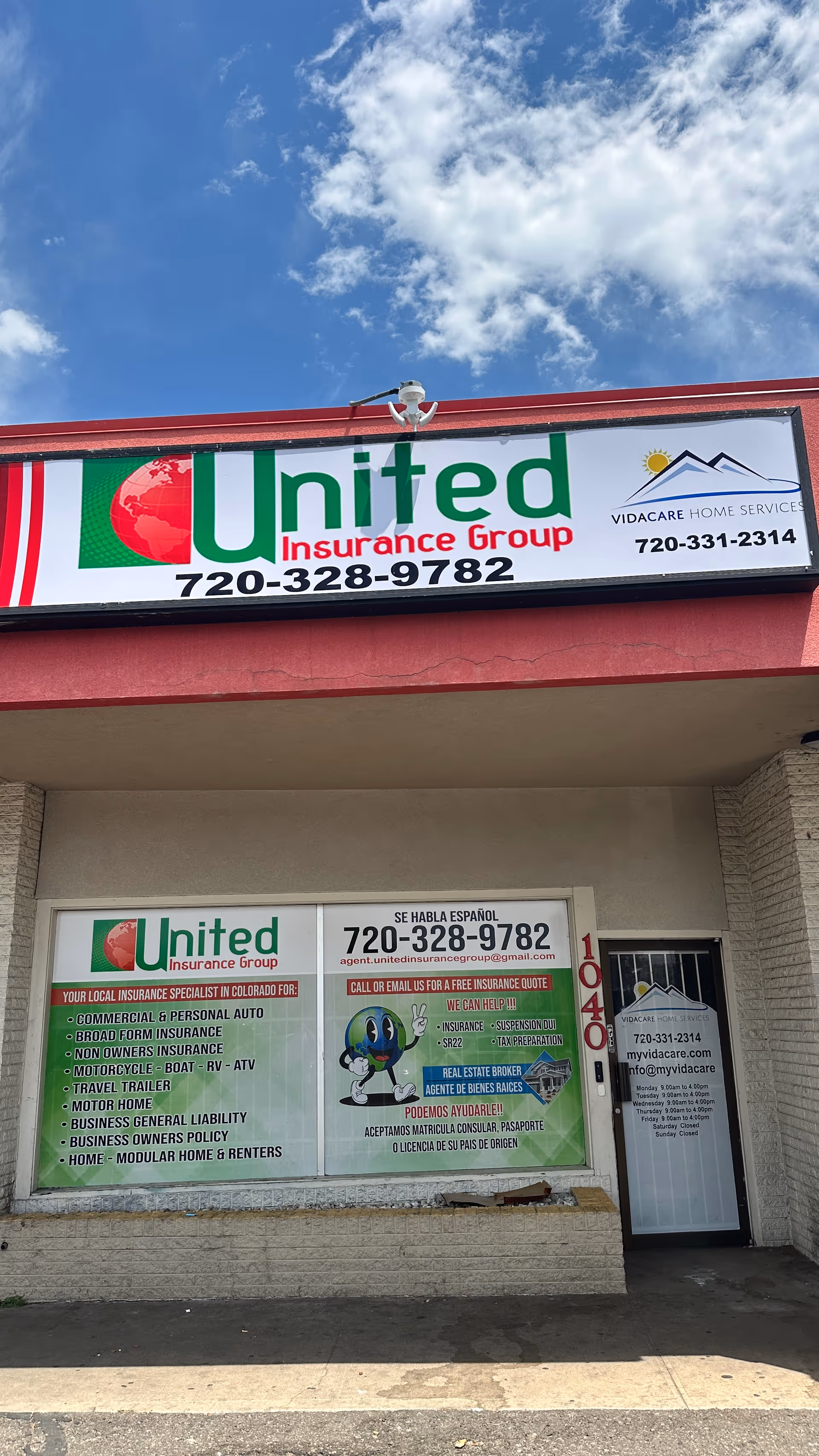 Exterior storefront with large insurance signs and a VidaCare Home Services sign.