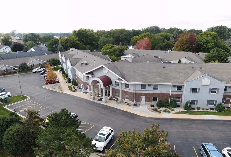 Aerial view of Renaissance Appleton senior living campus with connected buildings and parking.
