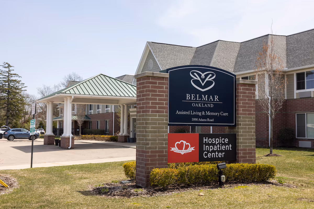 Exterior view of Belmar Oakland facility sign and entrance canopy at the front of building.