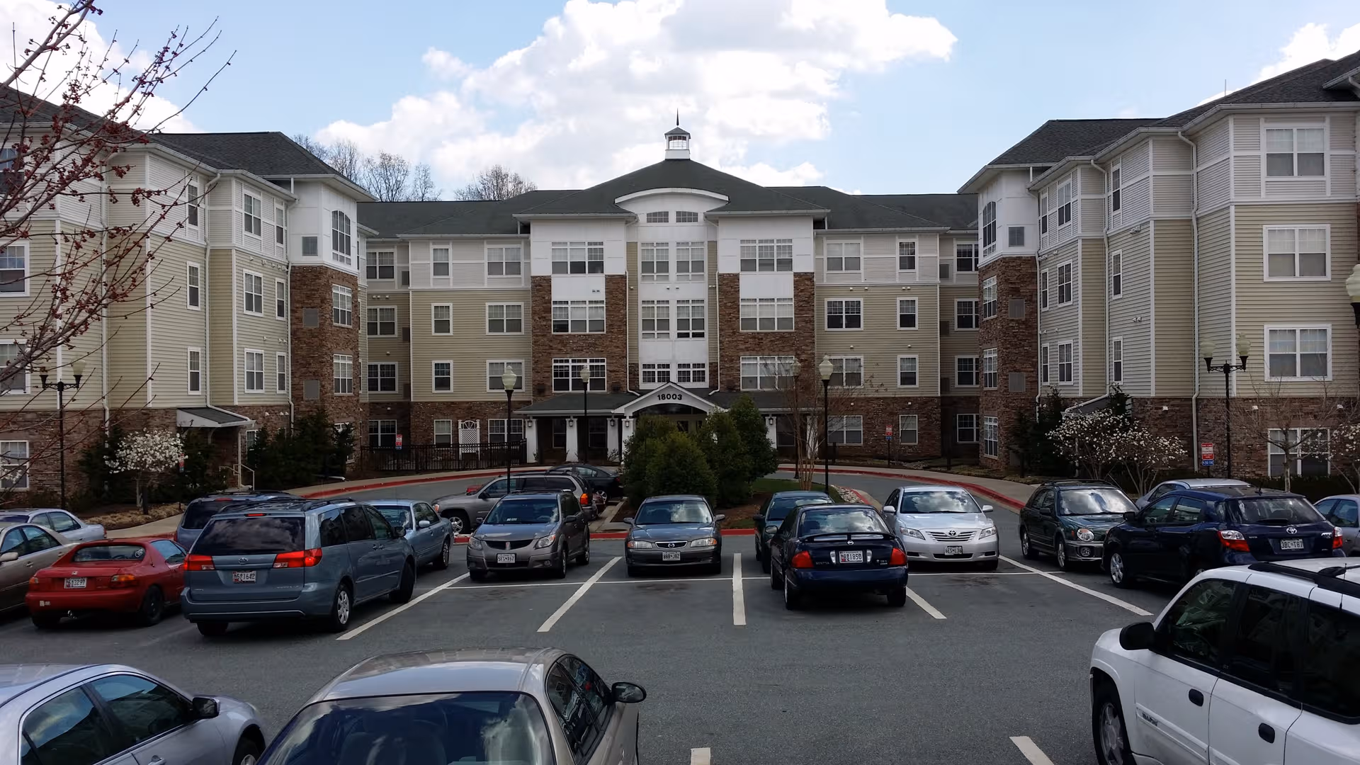 Willow Manor at Clopper's Mill exterior building with a parking lot in front.