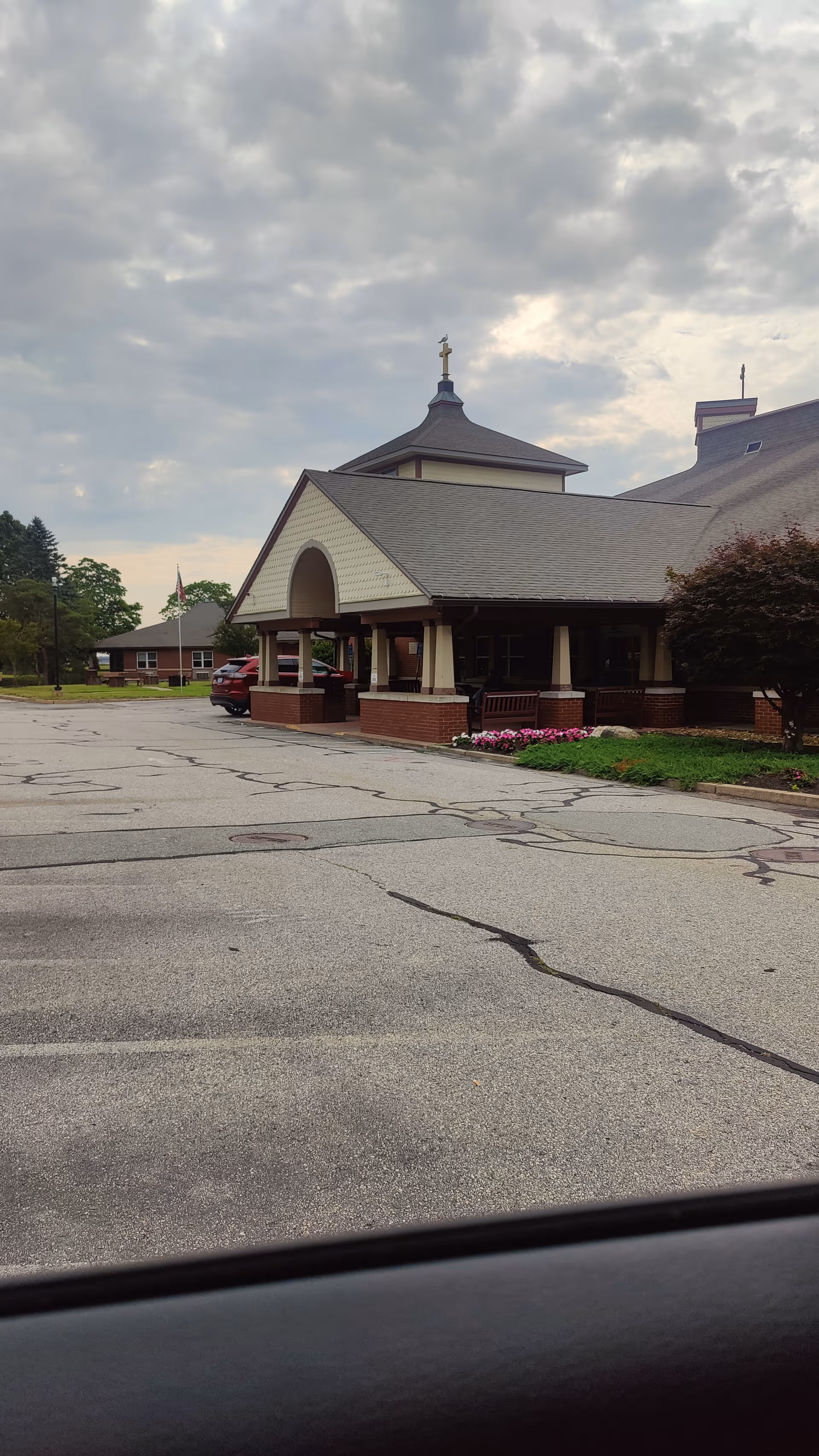 Front view of Bayview Rehabilitation at Scalabrini with a brick-covered porch entrance