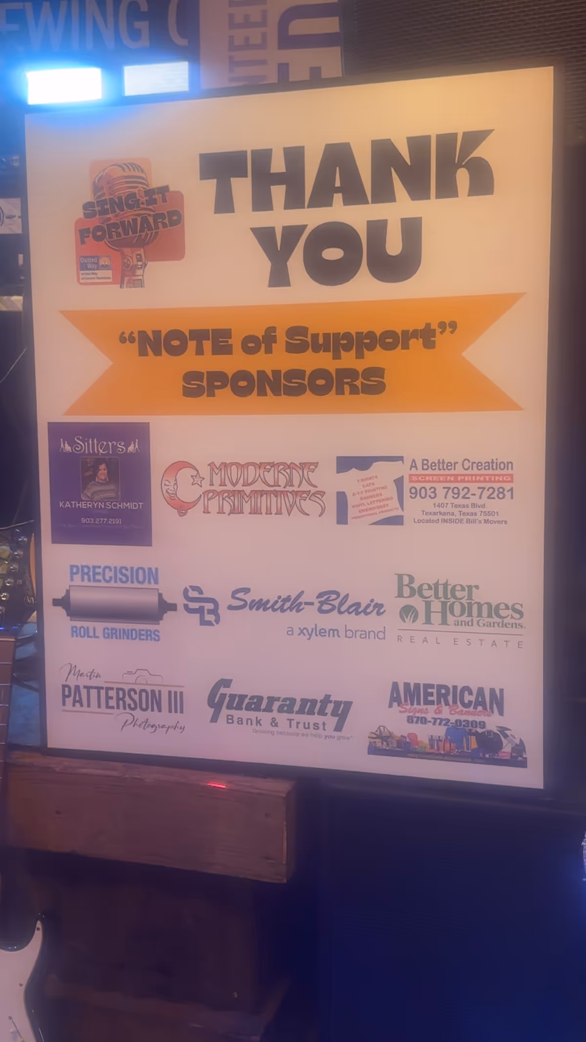 Indoor sponsor board at Sitters, LLP displaying a Thank You message and sponsor logos.