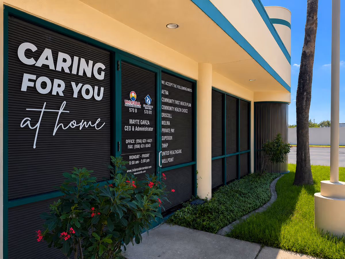 Exterior view of a care facility with a large Caring for you at home sign.