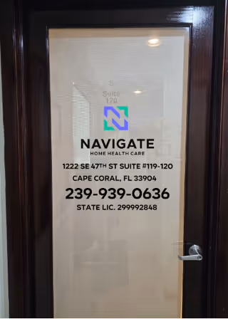 Door with Navigate Home Health Care sign and contact information.