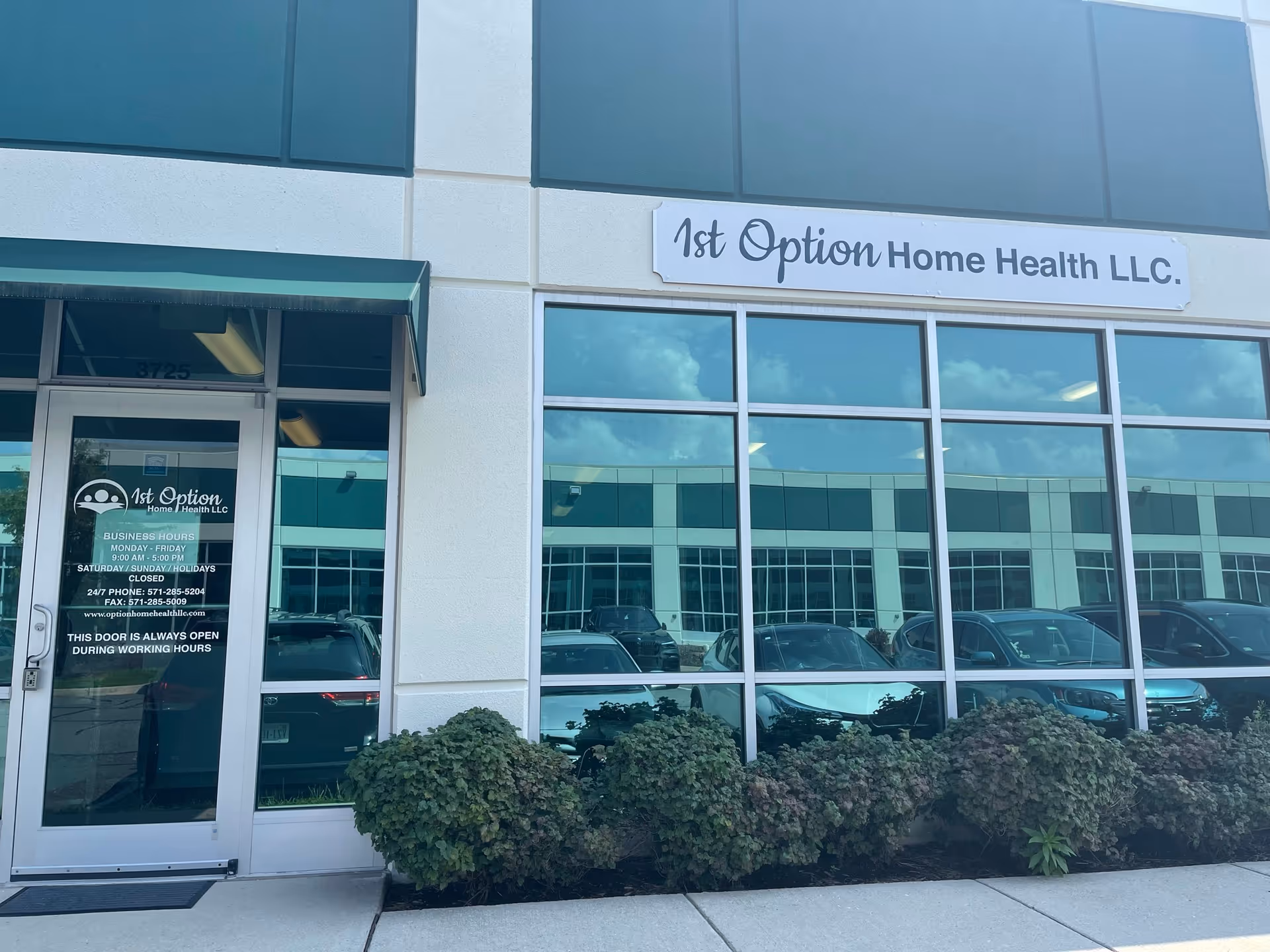 Front exterior of a building with '1st Option Home Health LLC' sign.