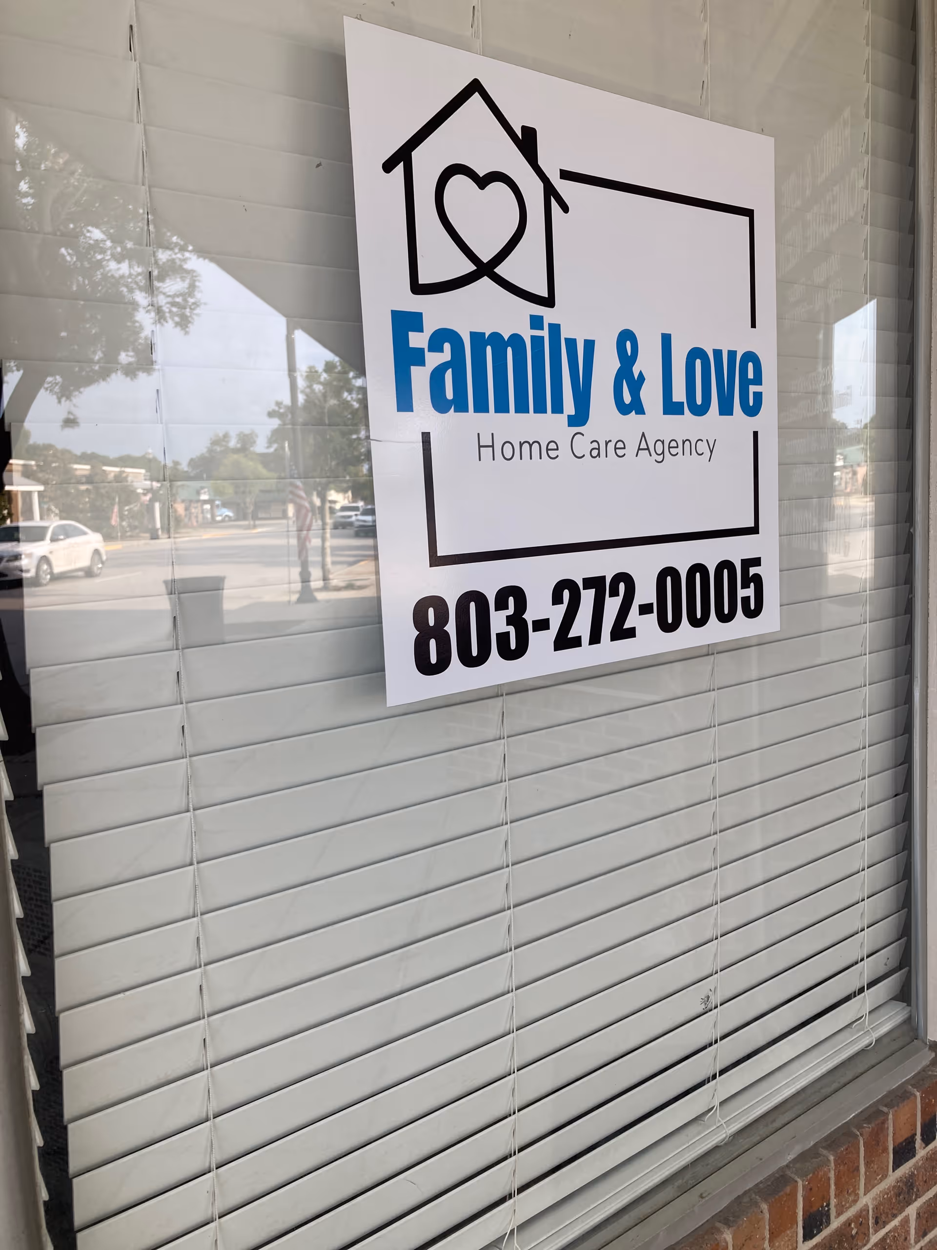 Storefront window sign reads 'Family & Love Home Care Agency' with phone number.