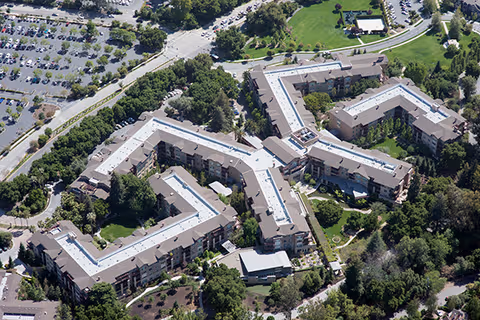 Aerial view of Vi at Palo Alto senior living campus showing interconnected buildings