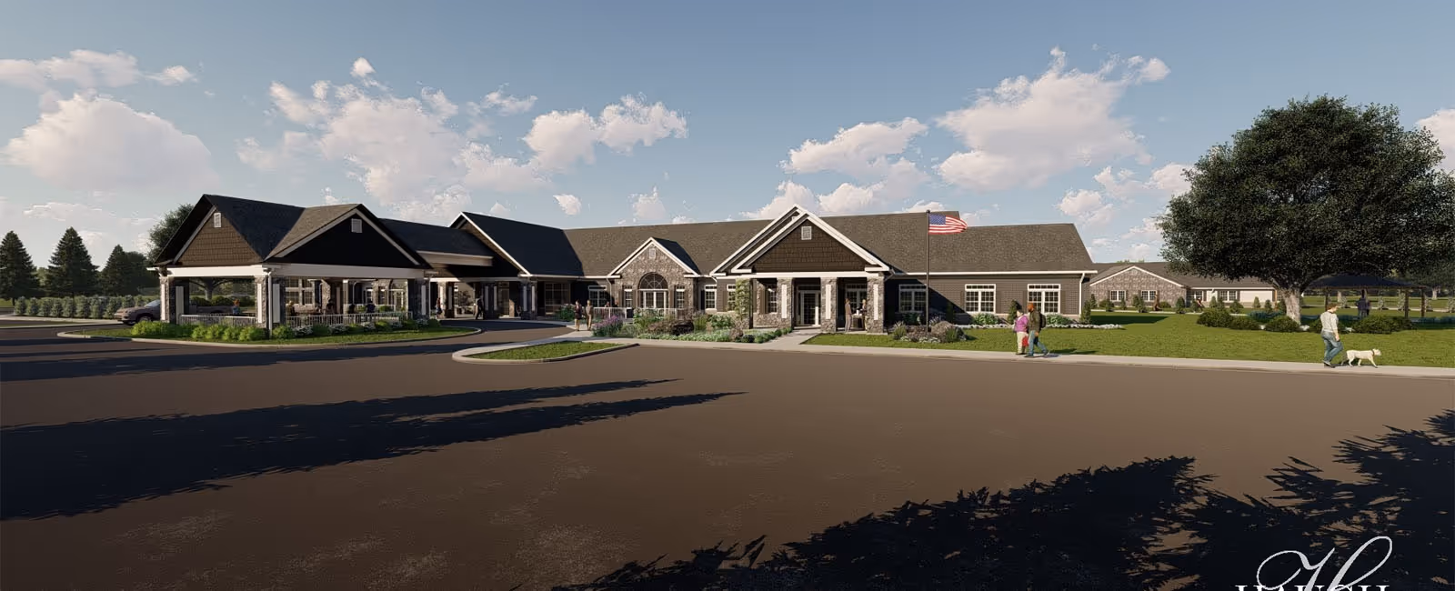 Exterior view of a single-story senior living facility with entrance, flag, and manicured landscaping.